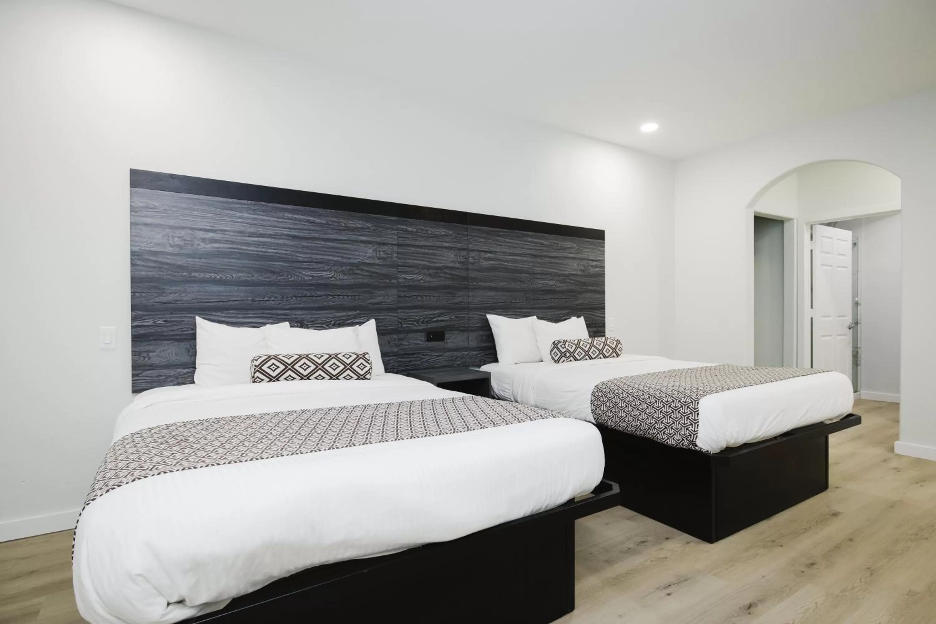 Bed in Sapphire Inn & Suites