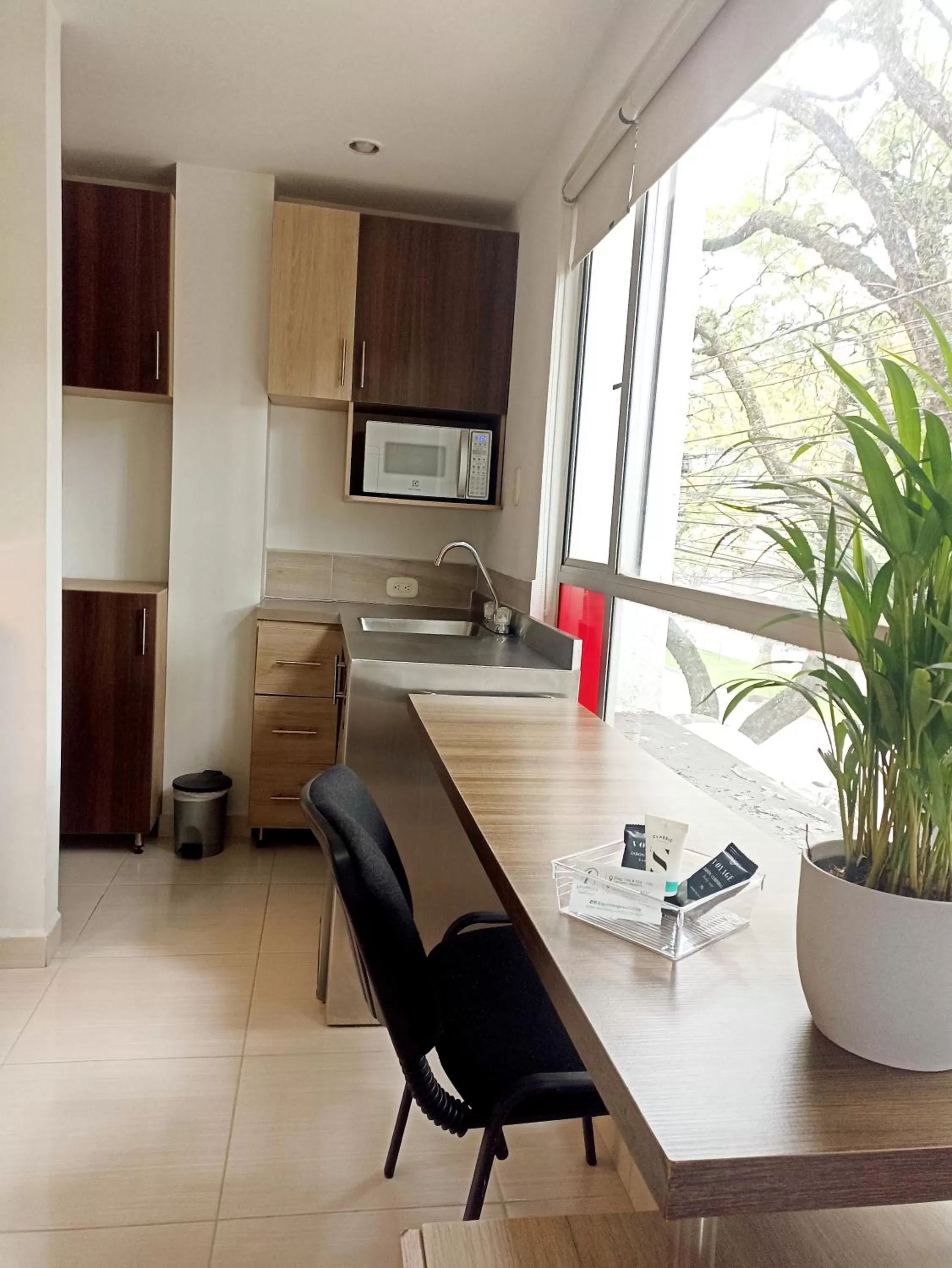 Kitchen or kitchenette in Laureles Guest House LGH Hotel