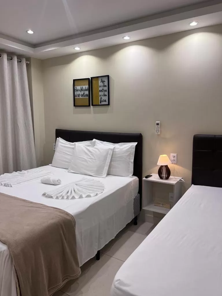 Bed in Pousada Arraial Tropical