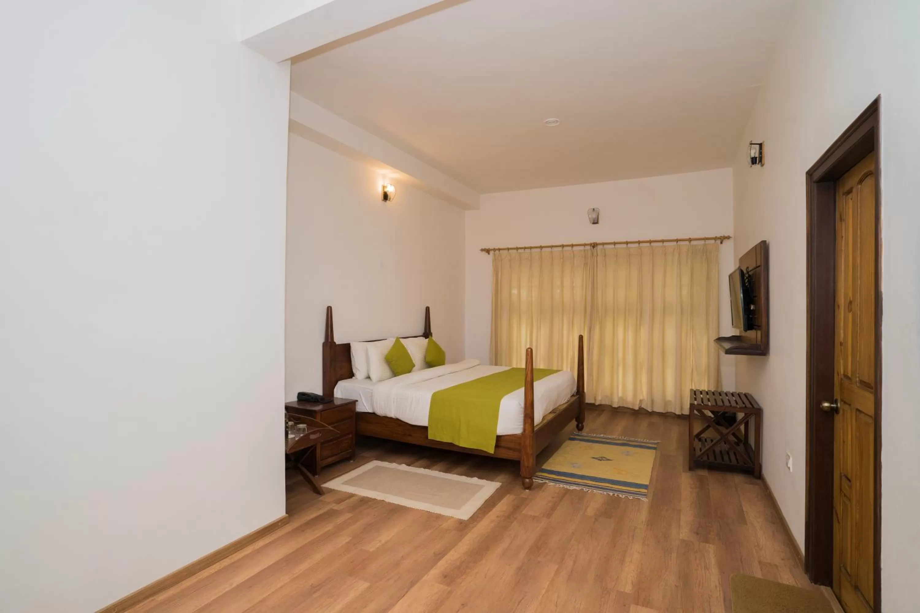 Bed in Bhikampur Lodge By Nine Hotels