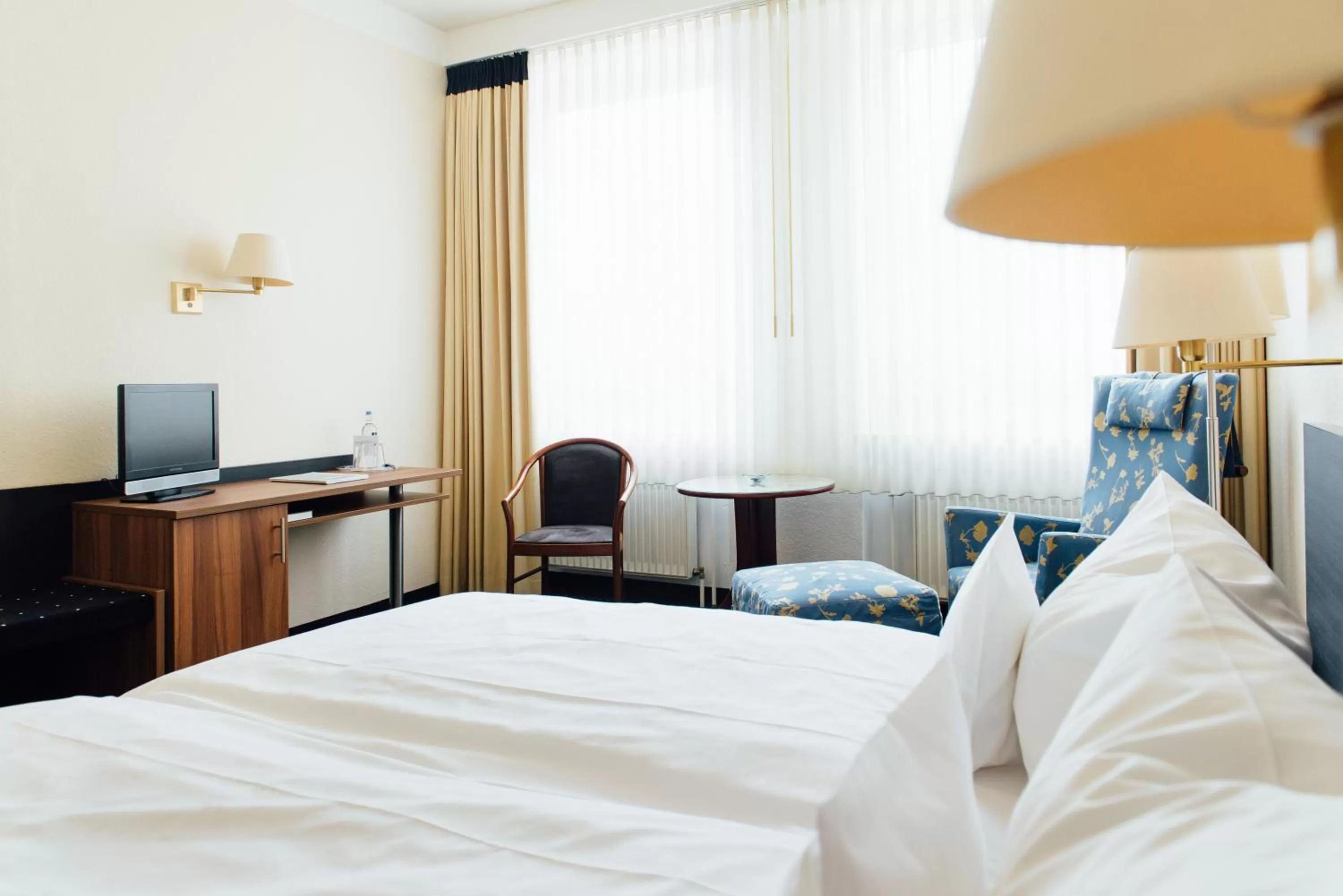 Photo of the whole room, Bed in Parkhotel Cloppenburg