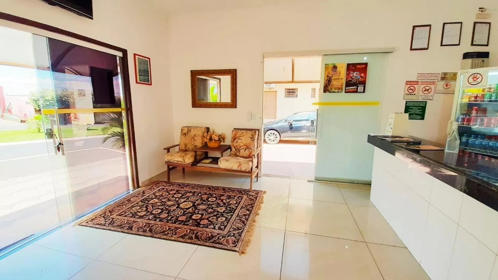 Lobby or reception, Kitchen/Kitchenette in Hotel Portela III