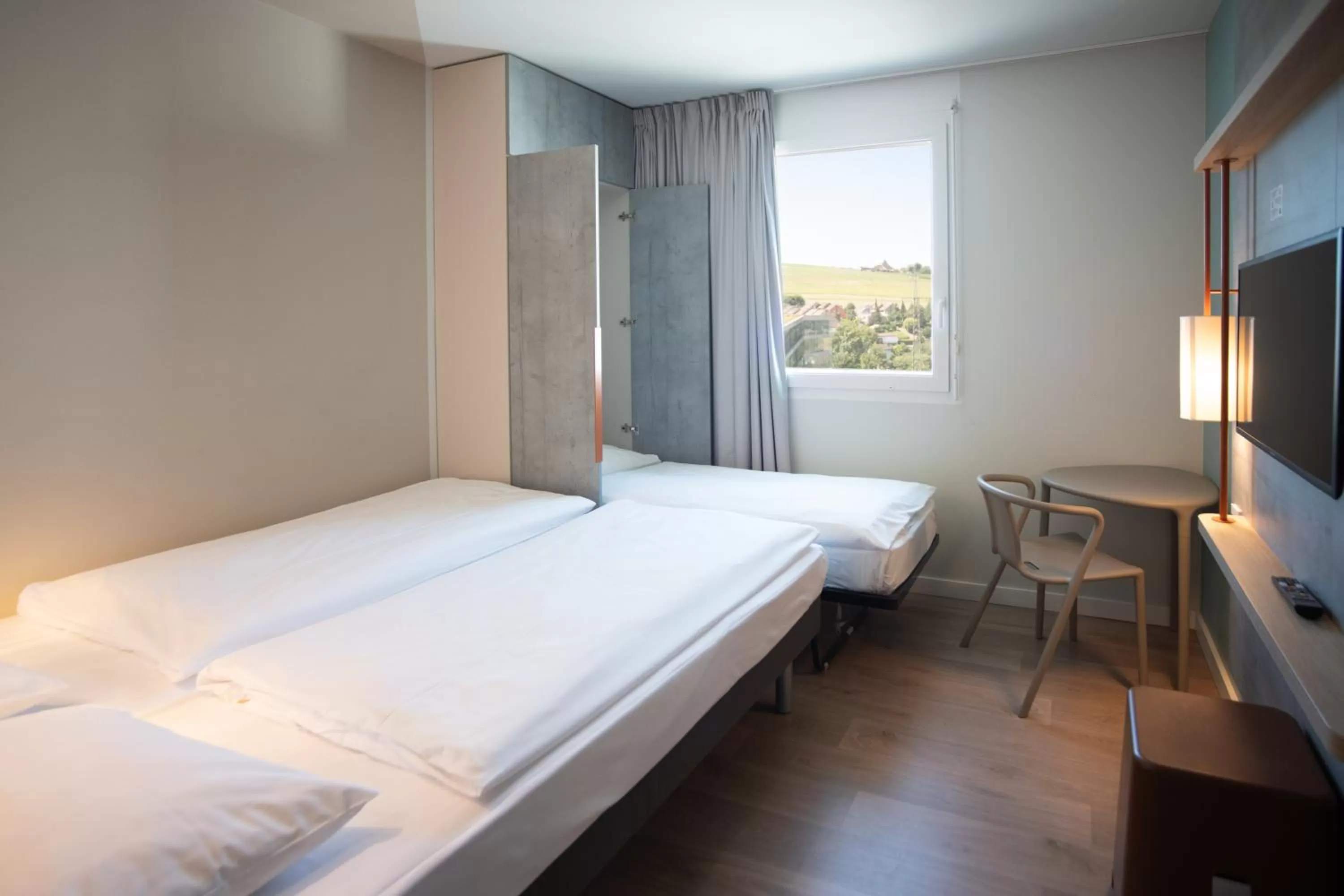 Bedroom, Bed in ibis budget Fribourg