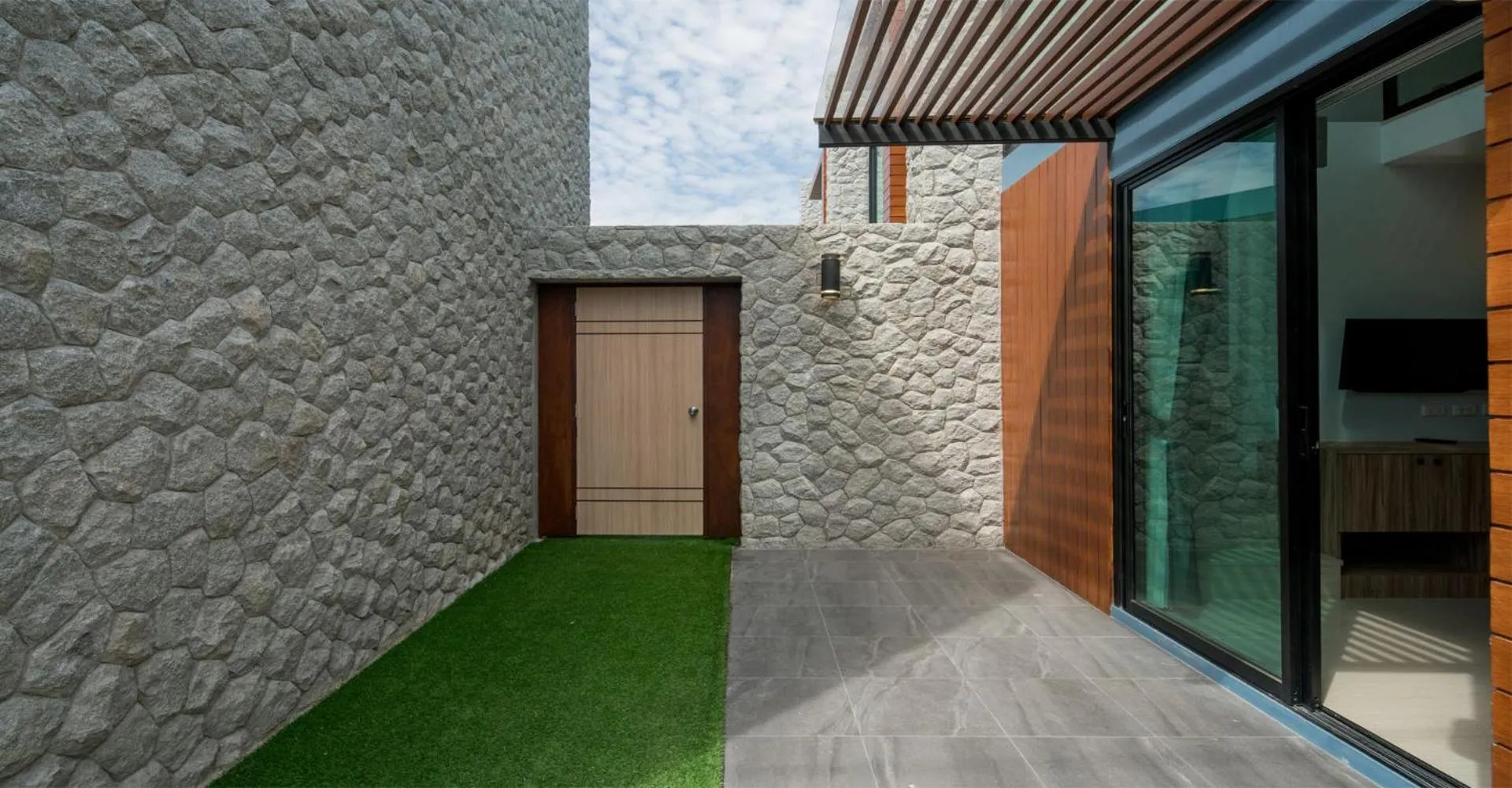 Facade/entrance in Peace Blue Naiharn Naturist Resort Phuket SHA Extra Plus