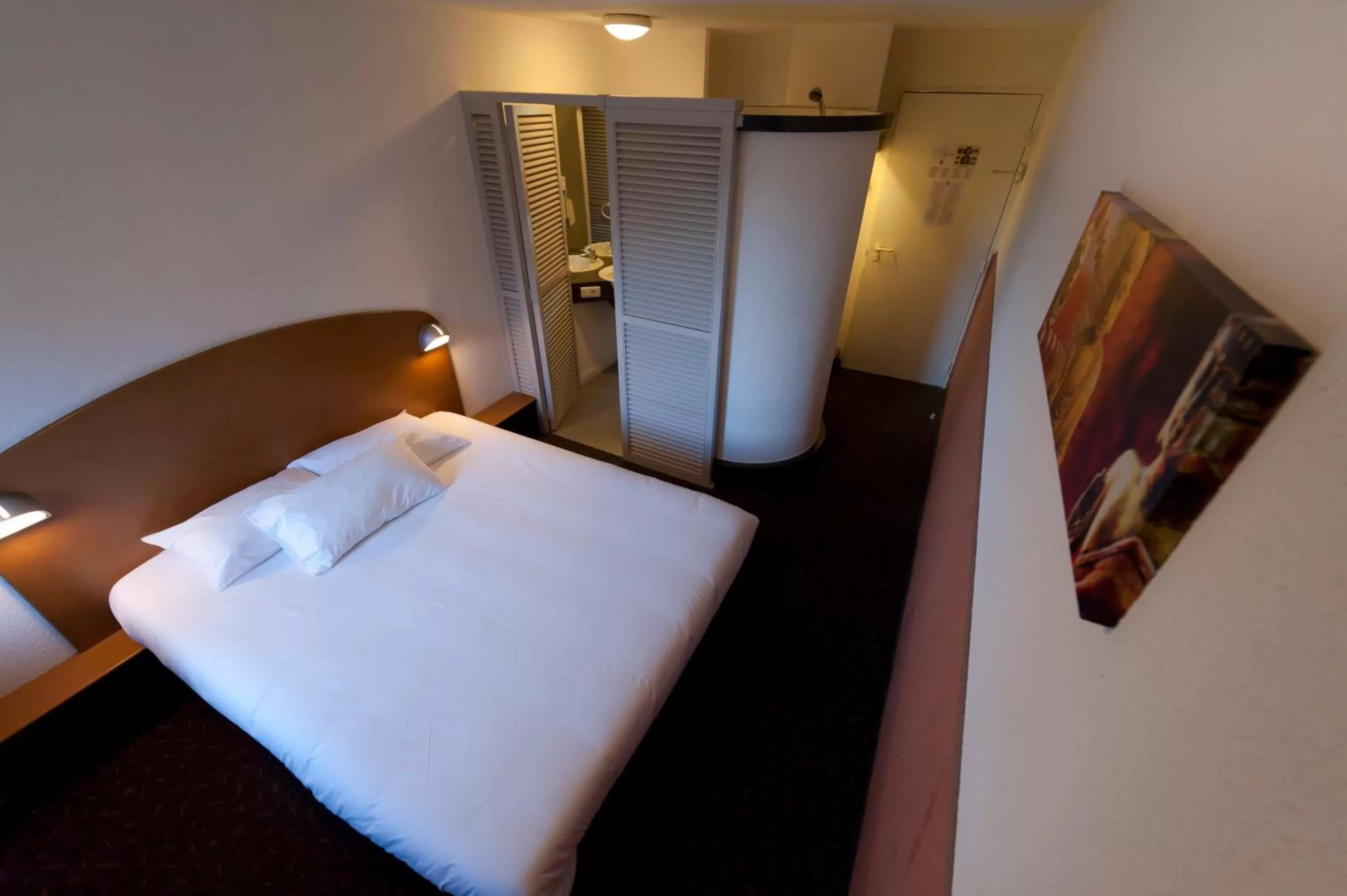 Bed in Quick Palace Pau Zénith