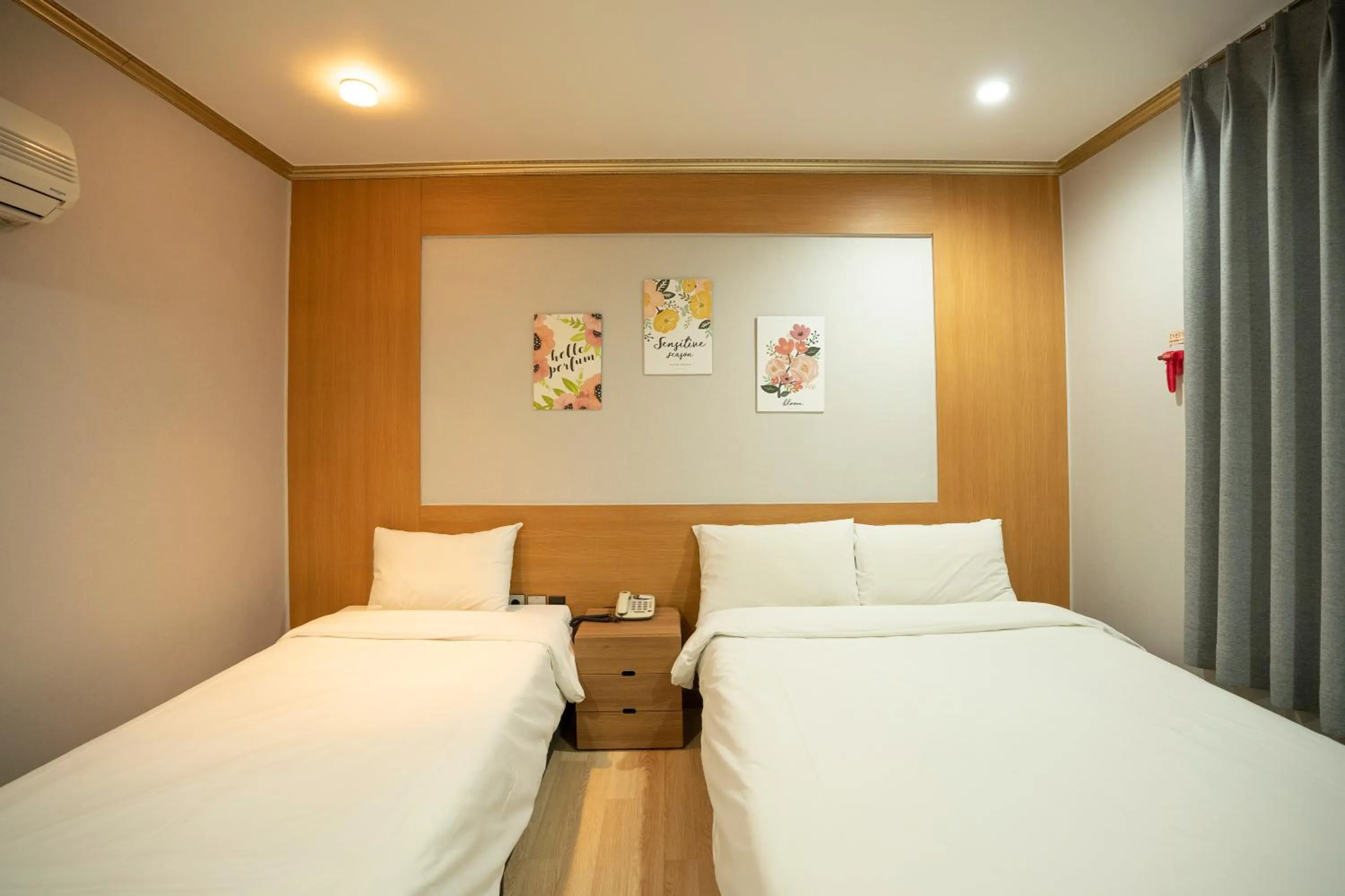 Bed in Jeju Stay Hotel