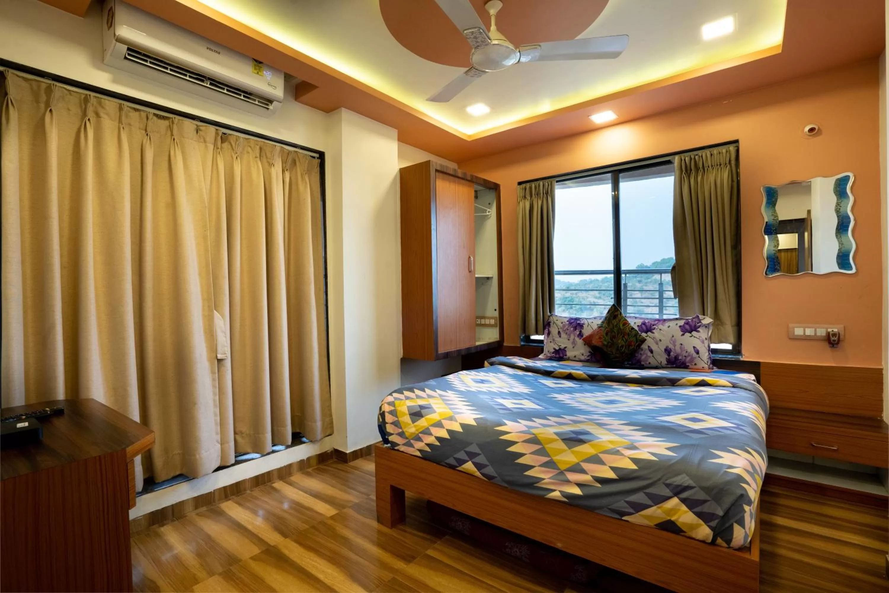 Bed in Pooja Villa Suites-Rooms and Pool, Igatpuri