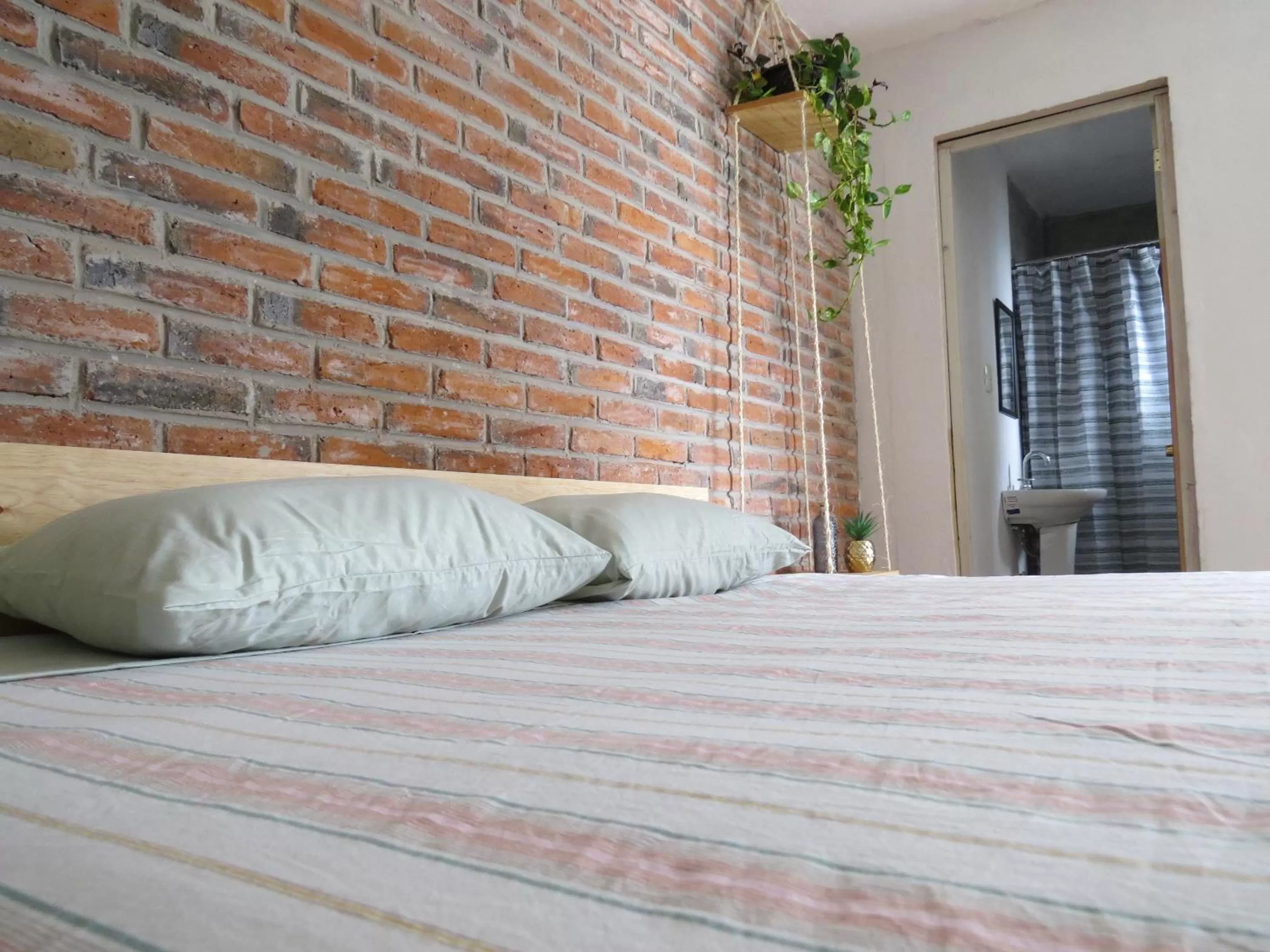 Bed in Hostal Hoja Santa