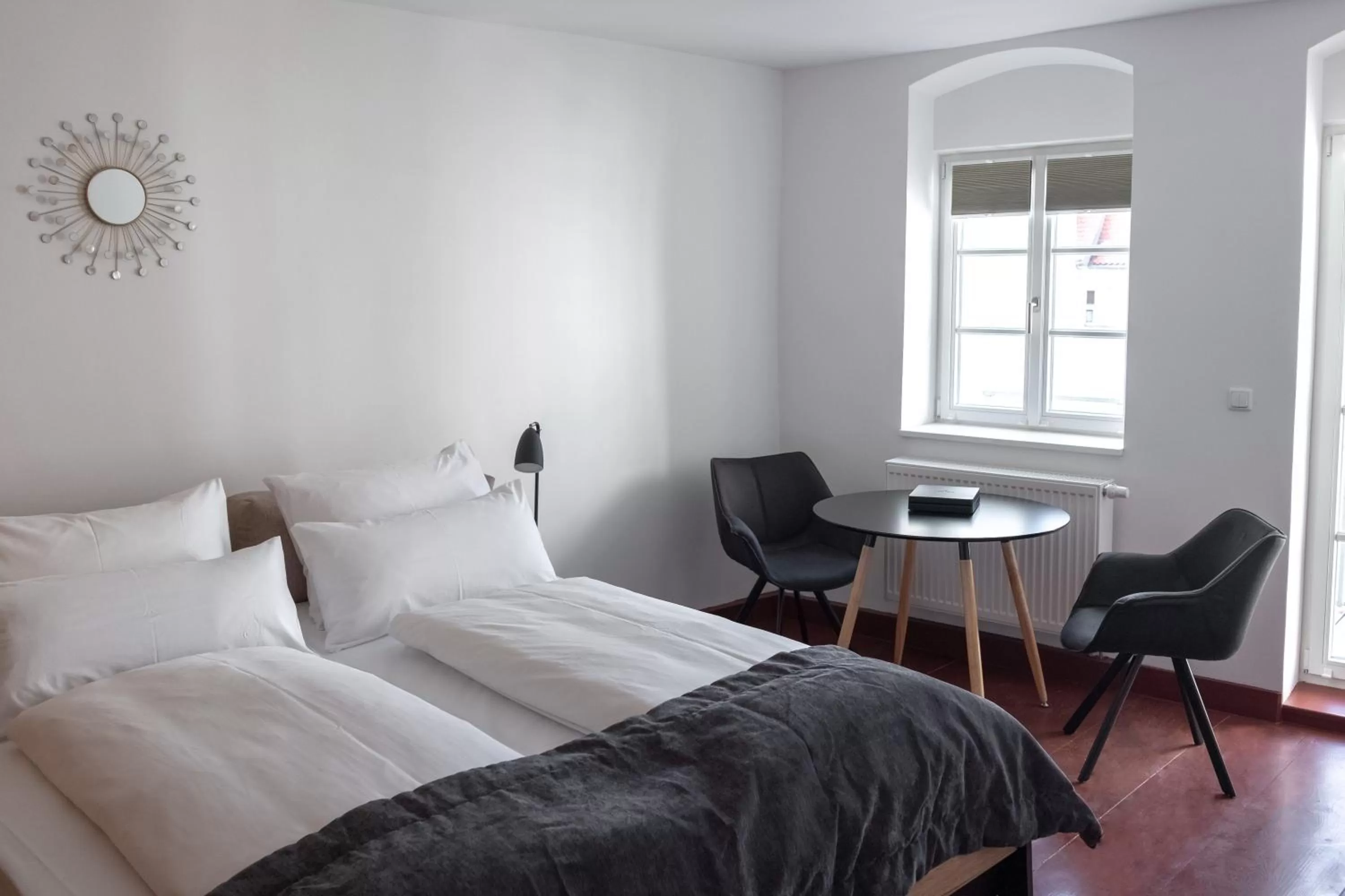 Bed in ANA Living Augsburg City Center by Arthotel ANA - Self-Service-Hotel