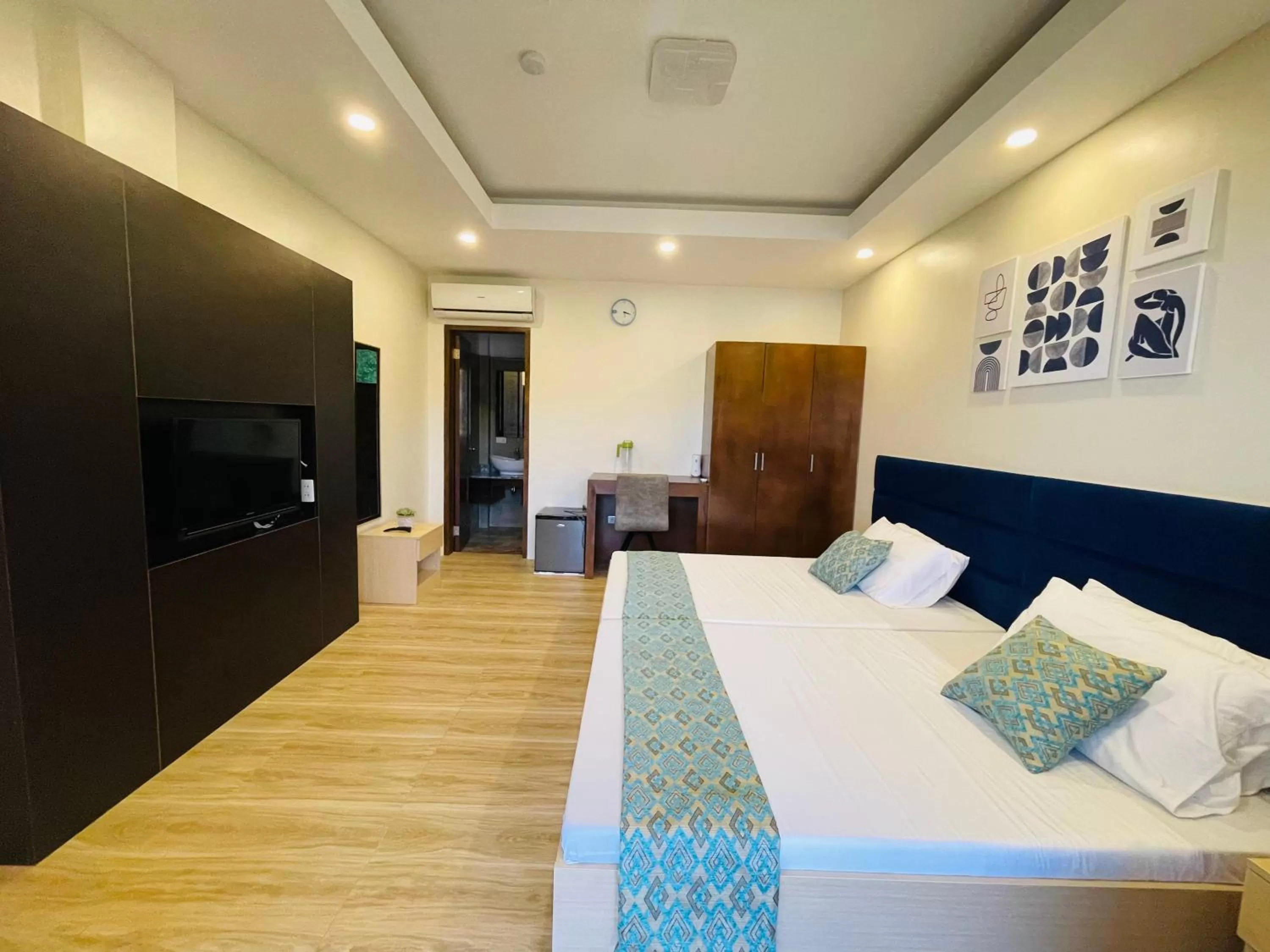 Bed in FIG Sunset View Resort