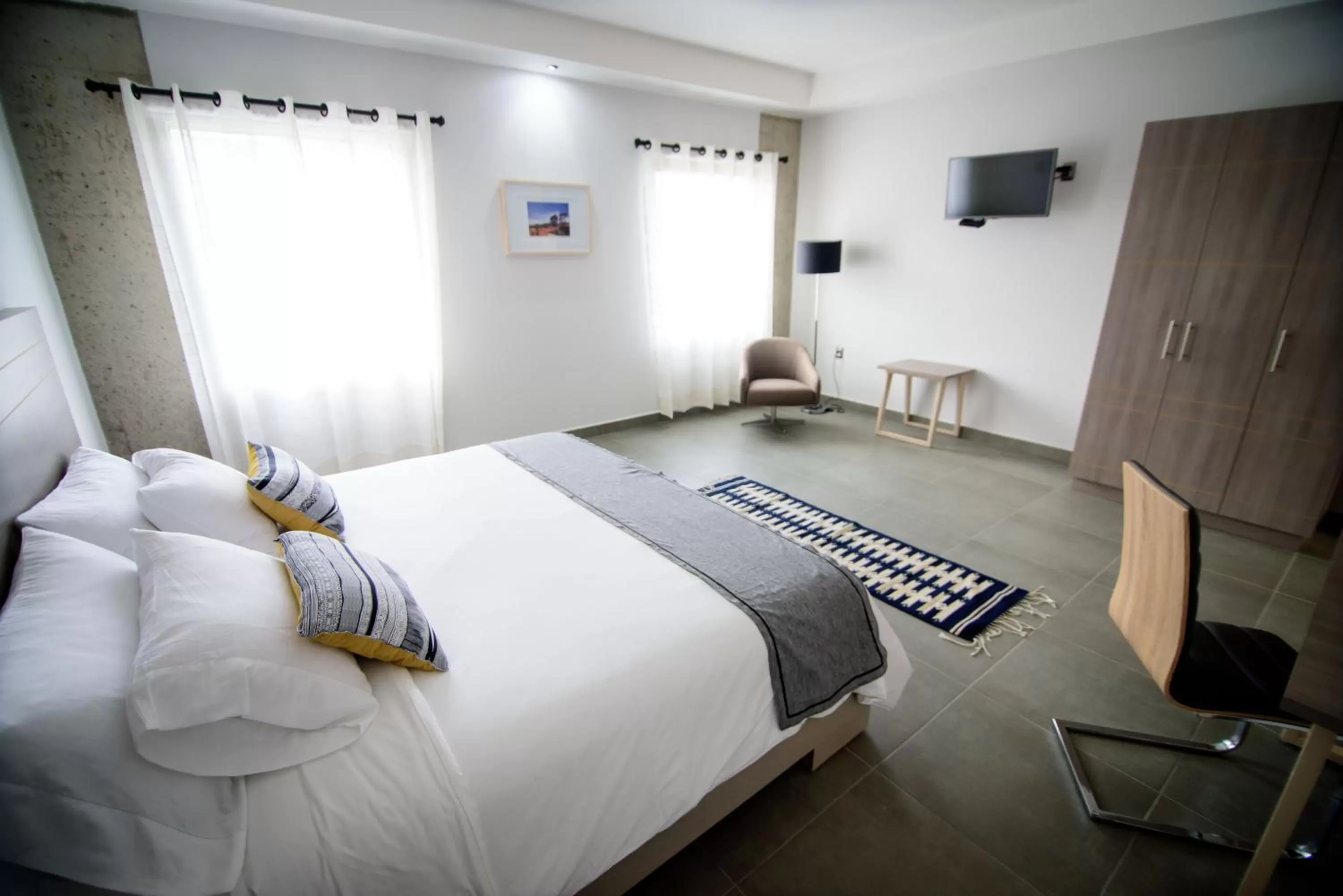 Photo of the whole room, Bed in Maria Ines Hotel Suite