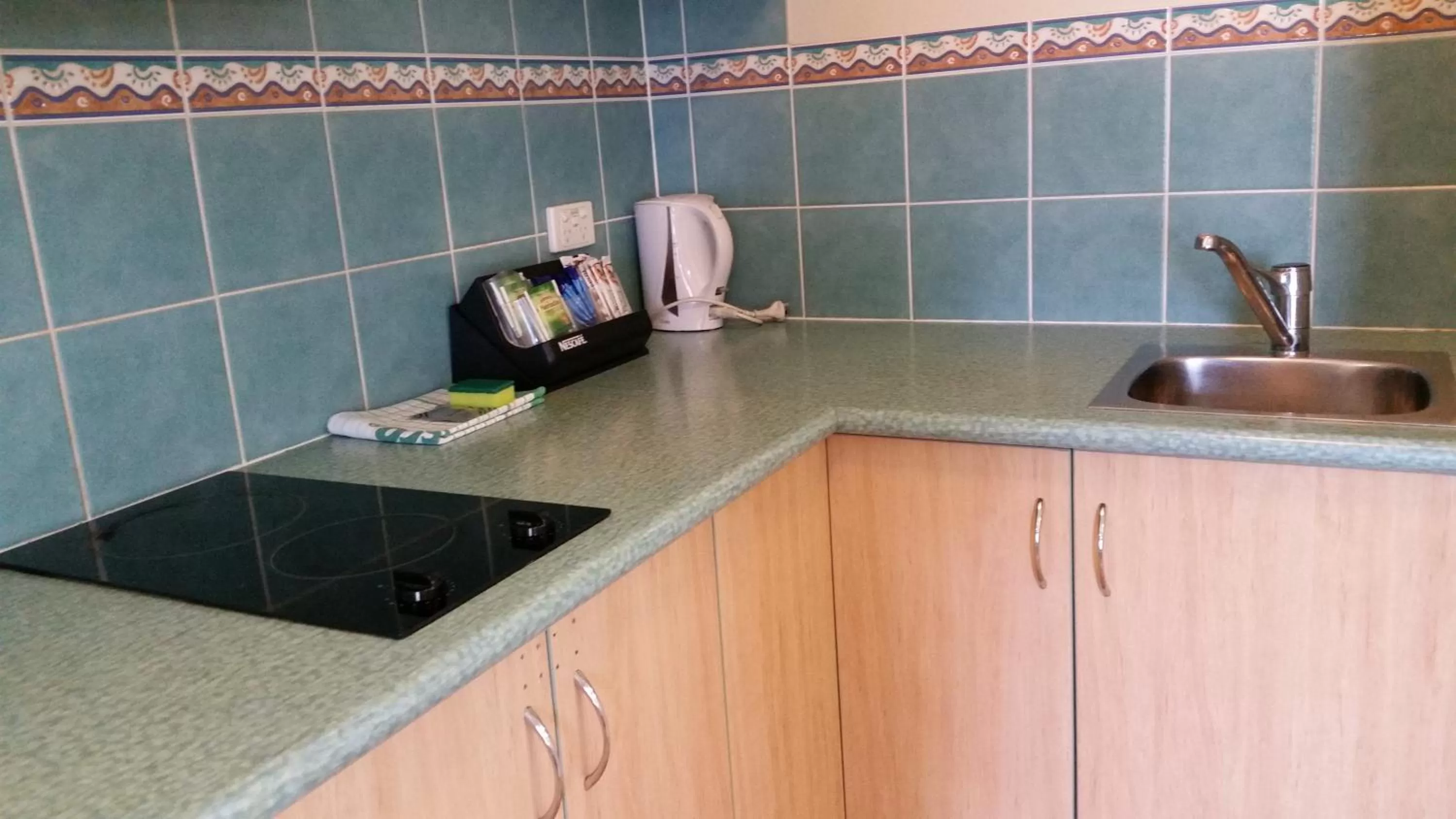 Kitchen or kitchenette in Cairns Gateway Resort