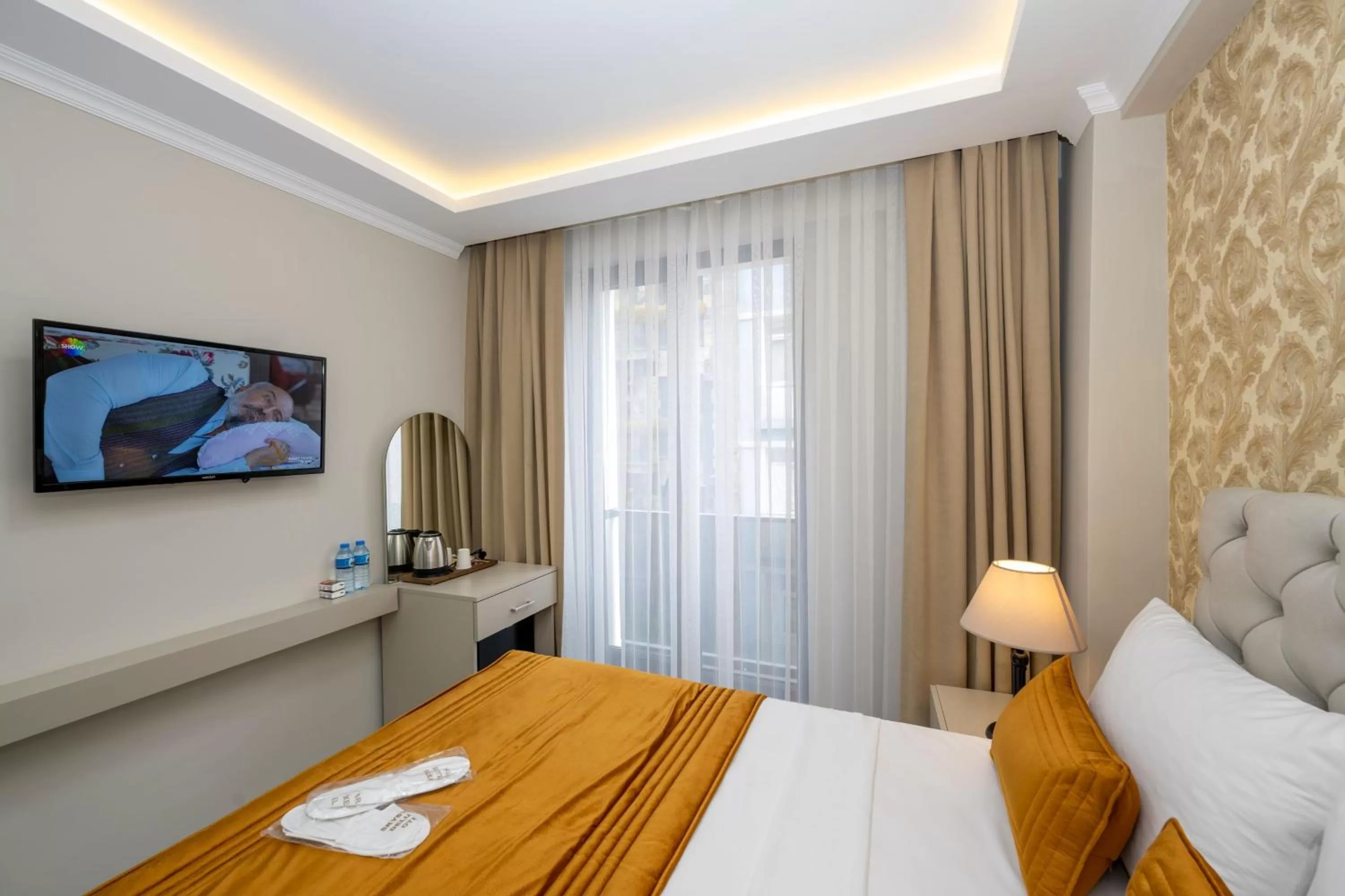 Bed in SKYSTAR DELUXE HOTEL