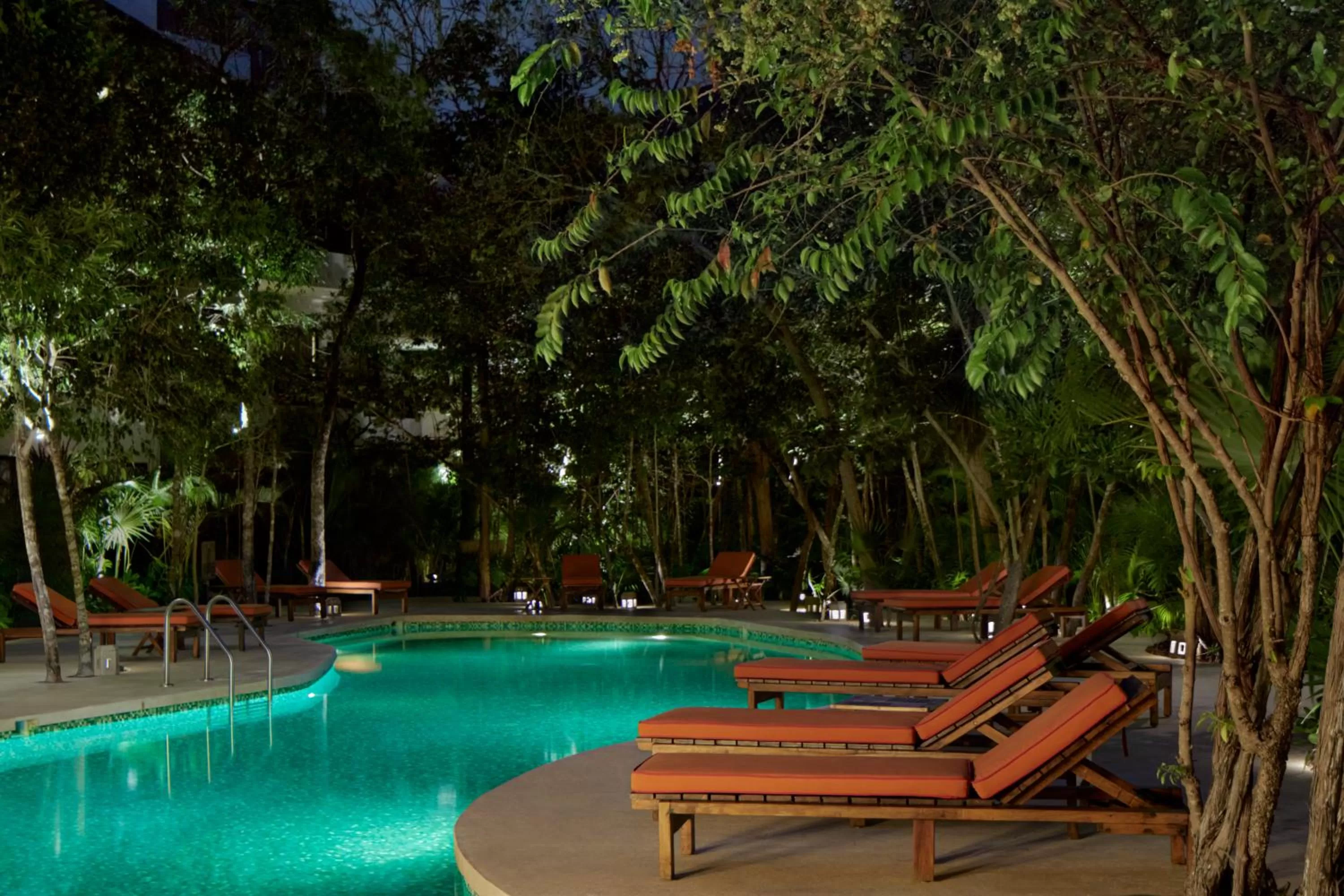 Swimming pool in Kimpton Aluna Resort Tulum by IHG