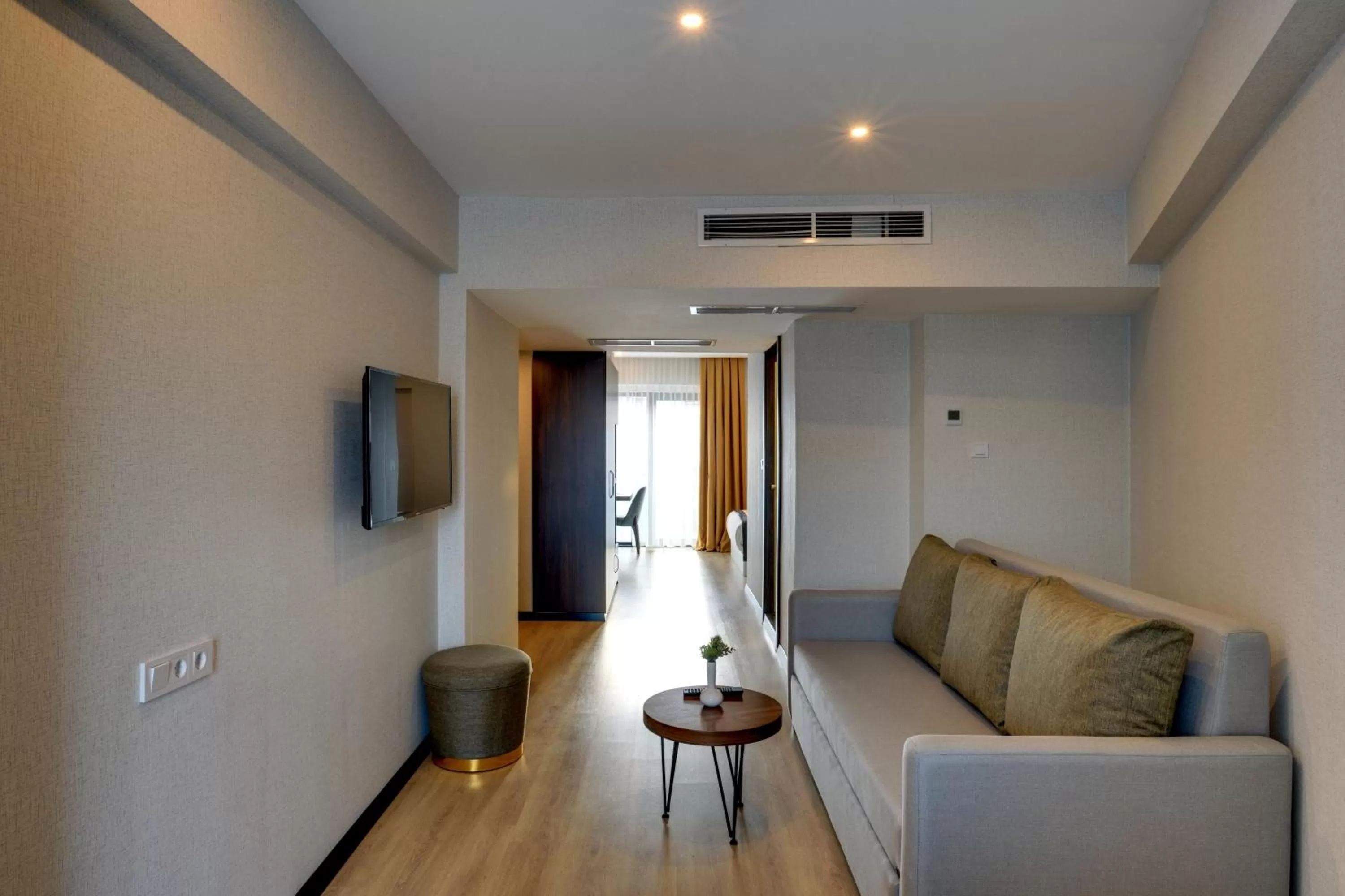 Communal lounge/ TV room in Leo Suites