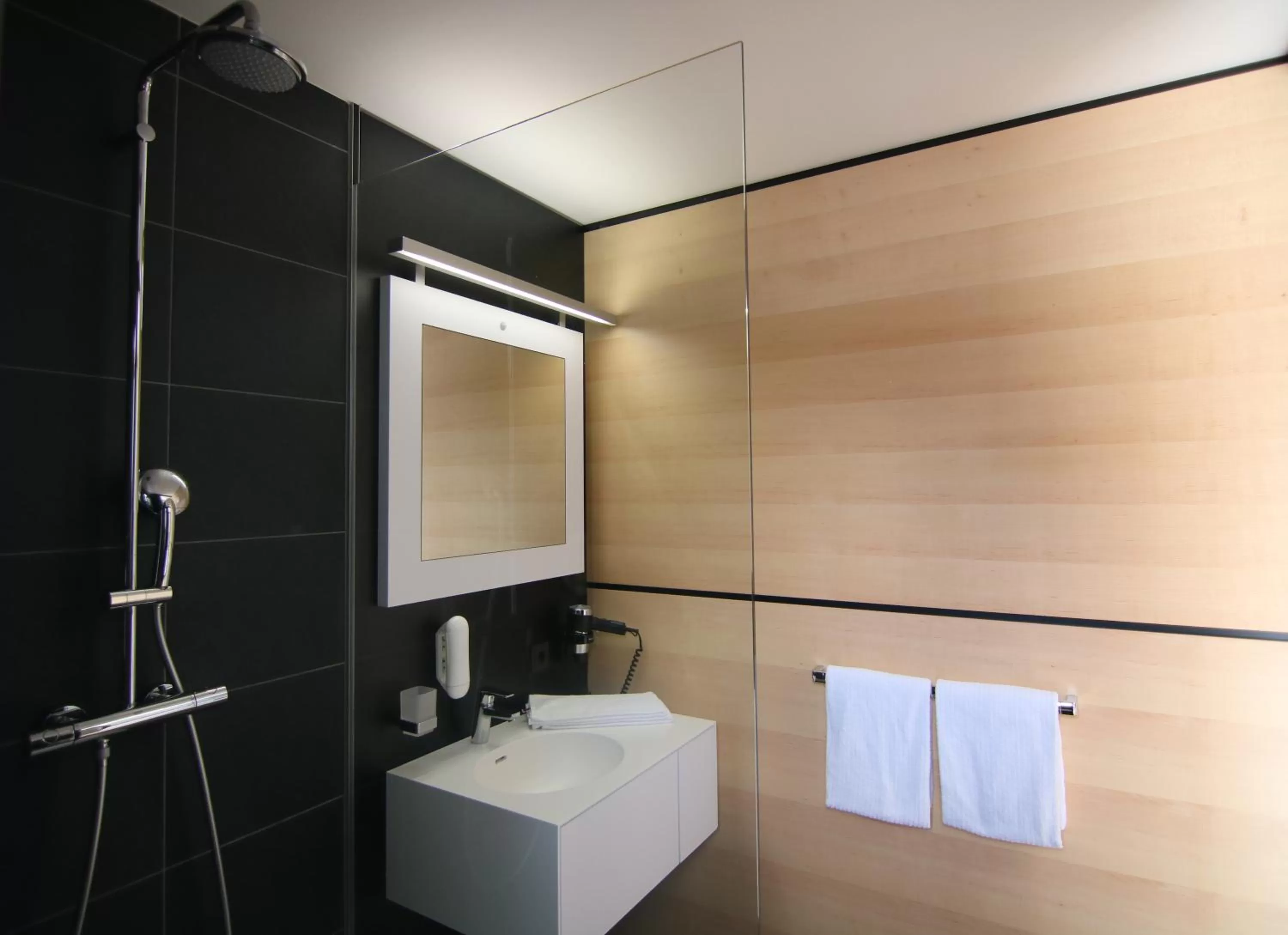Bathroom in AI Hotel by WMM Hotels