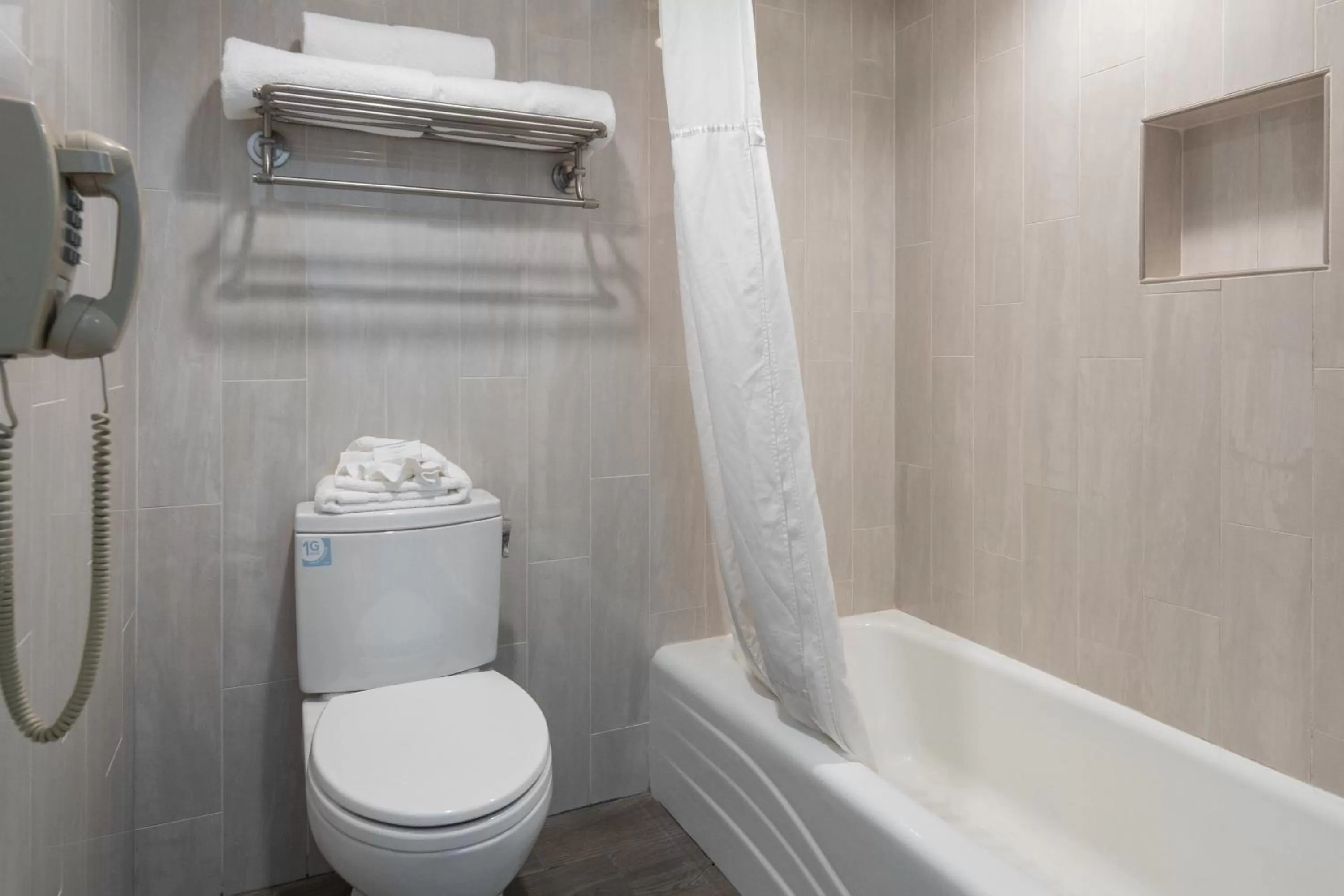 Toilet in Atherton Park Inn and Suites