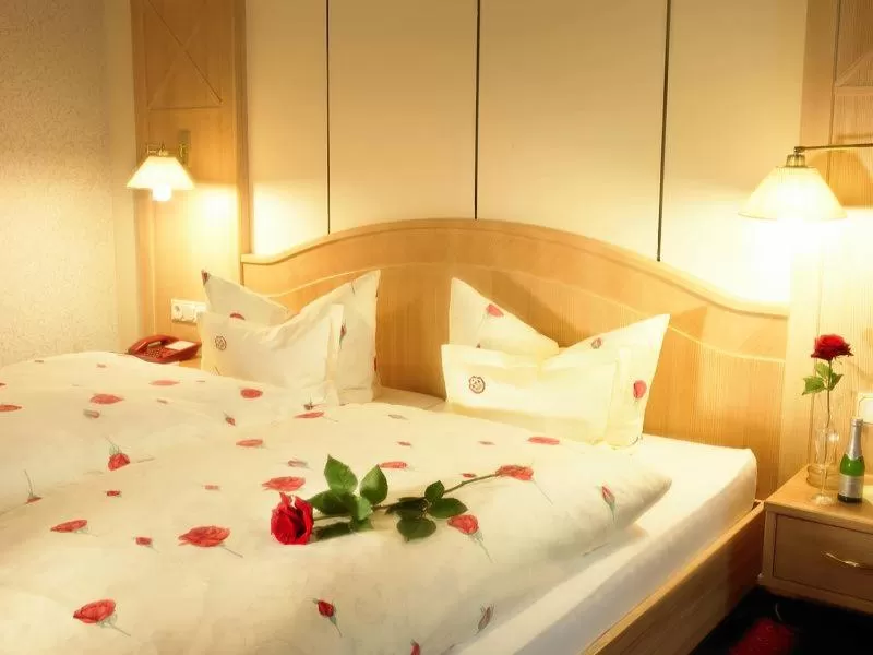 Living room, Bed in Sporthotel Göbel