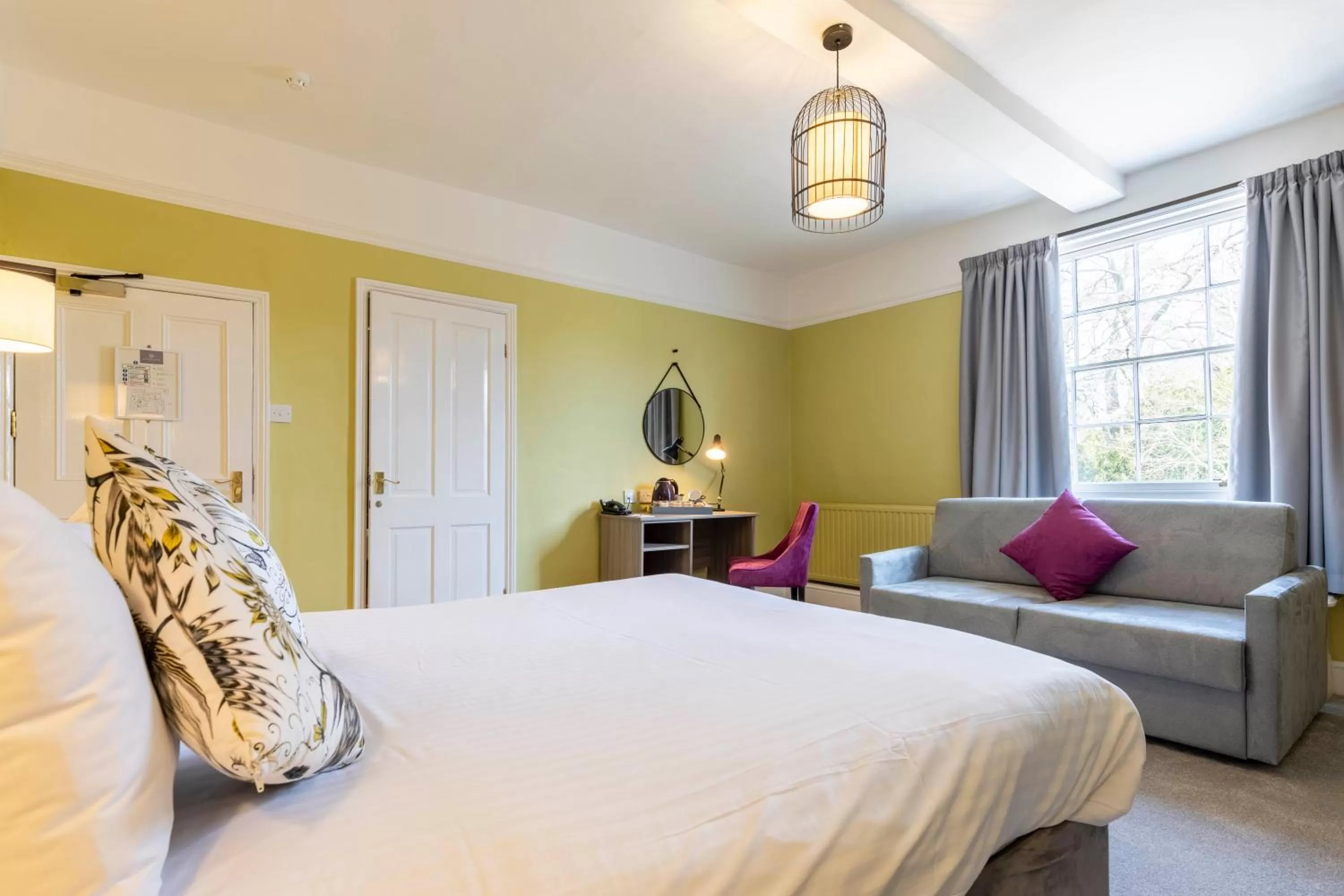 Bed in Wisteria Hotel