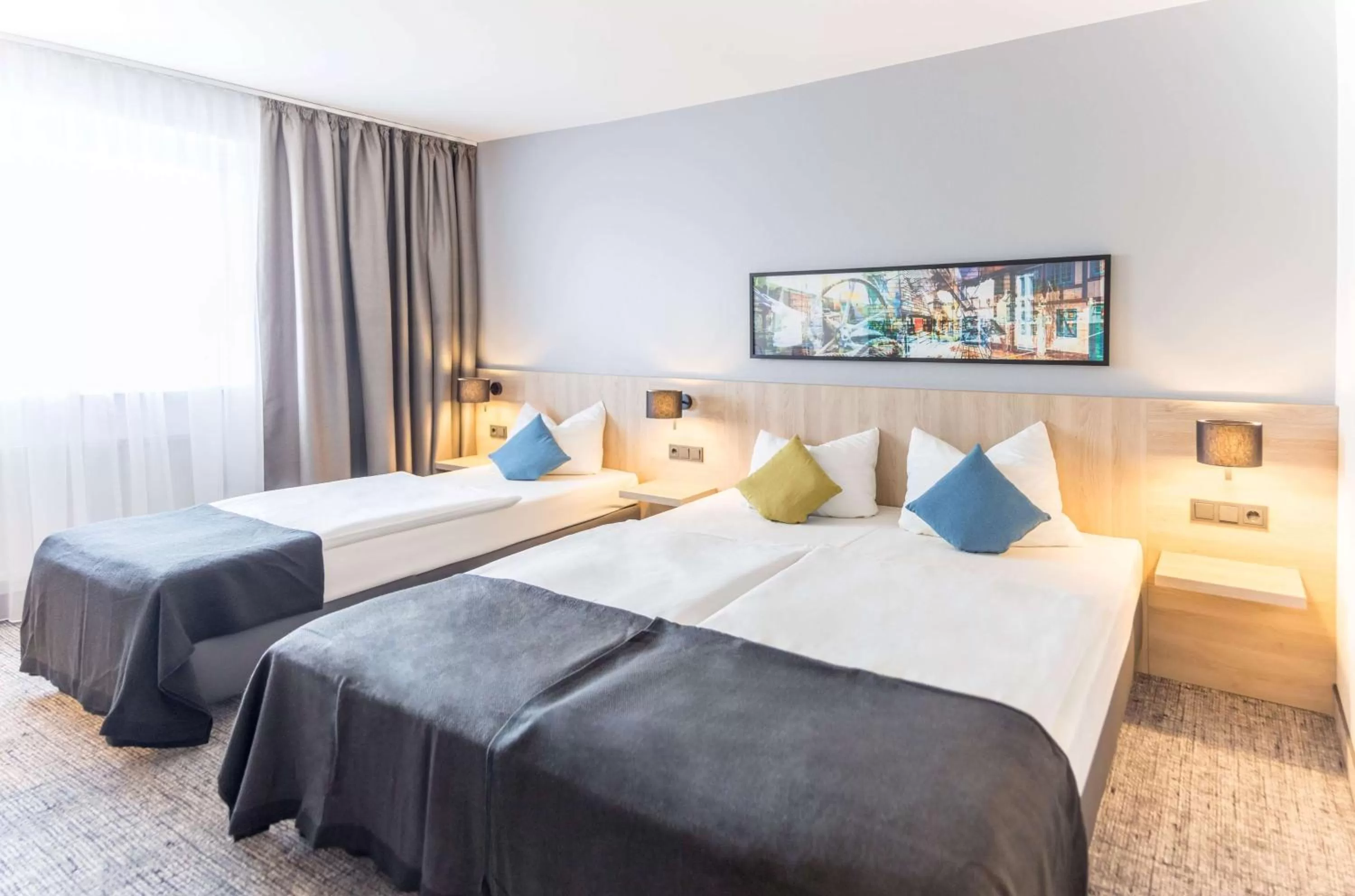 Photo of the whole room, Bed in Ramada by Wyndham Flensburg City