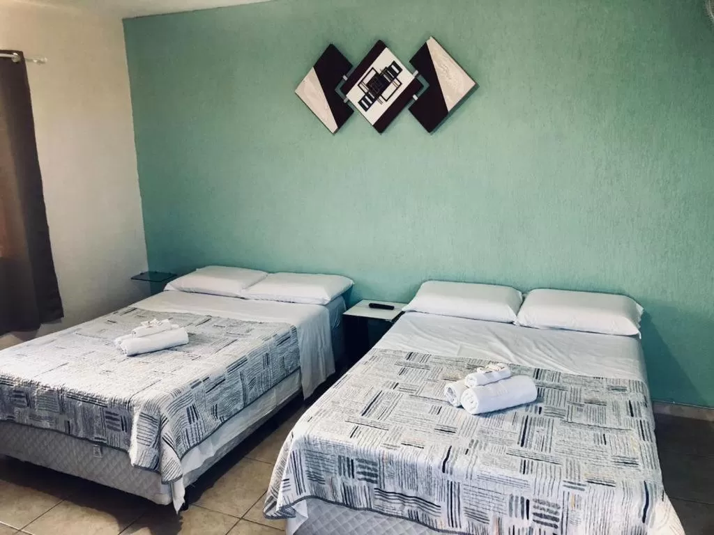 Bed in Pousada Córdoba Cabo Frio