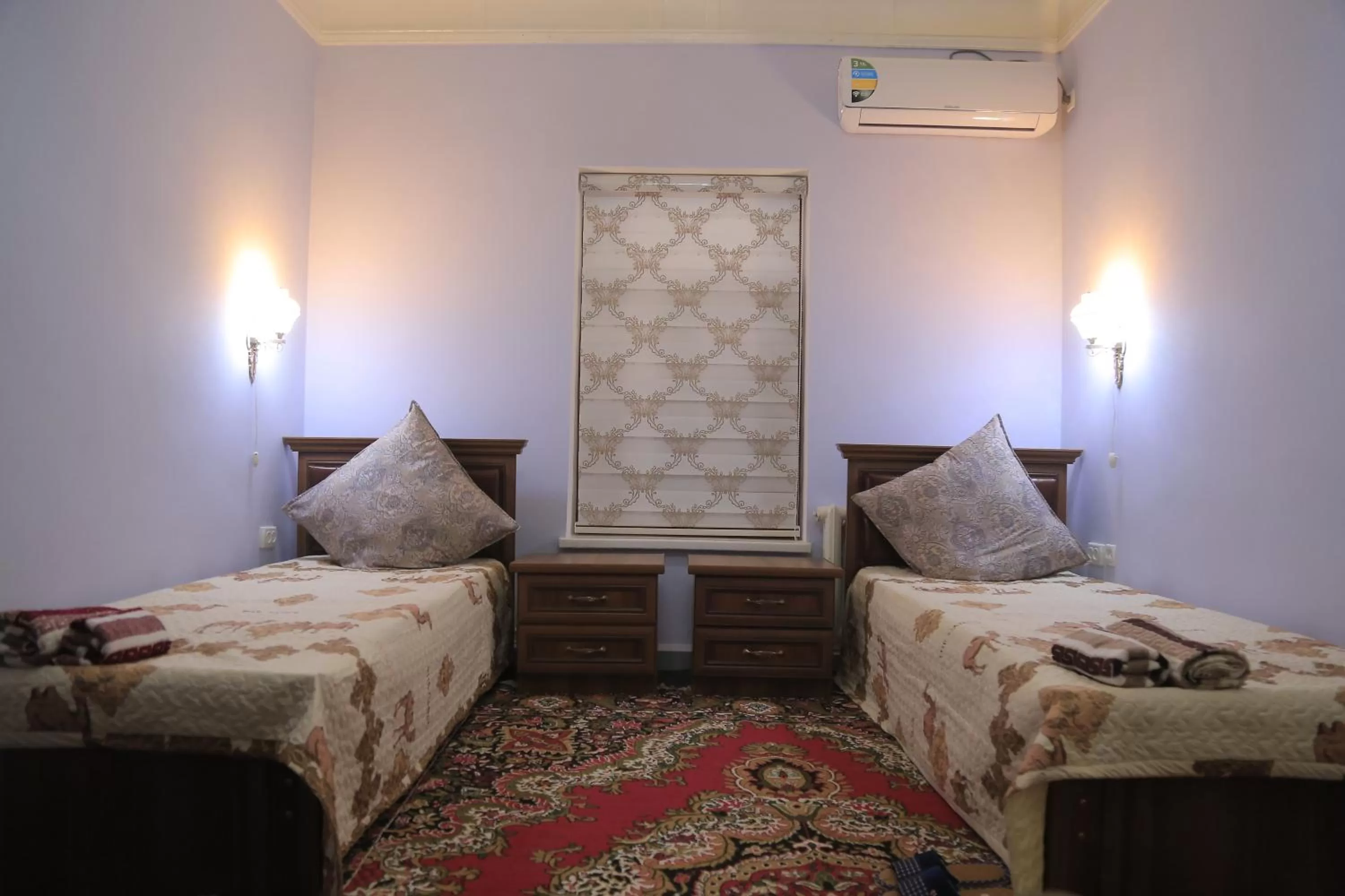 Photo of the whole room, Bed in Alliance hotel bukhara