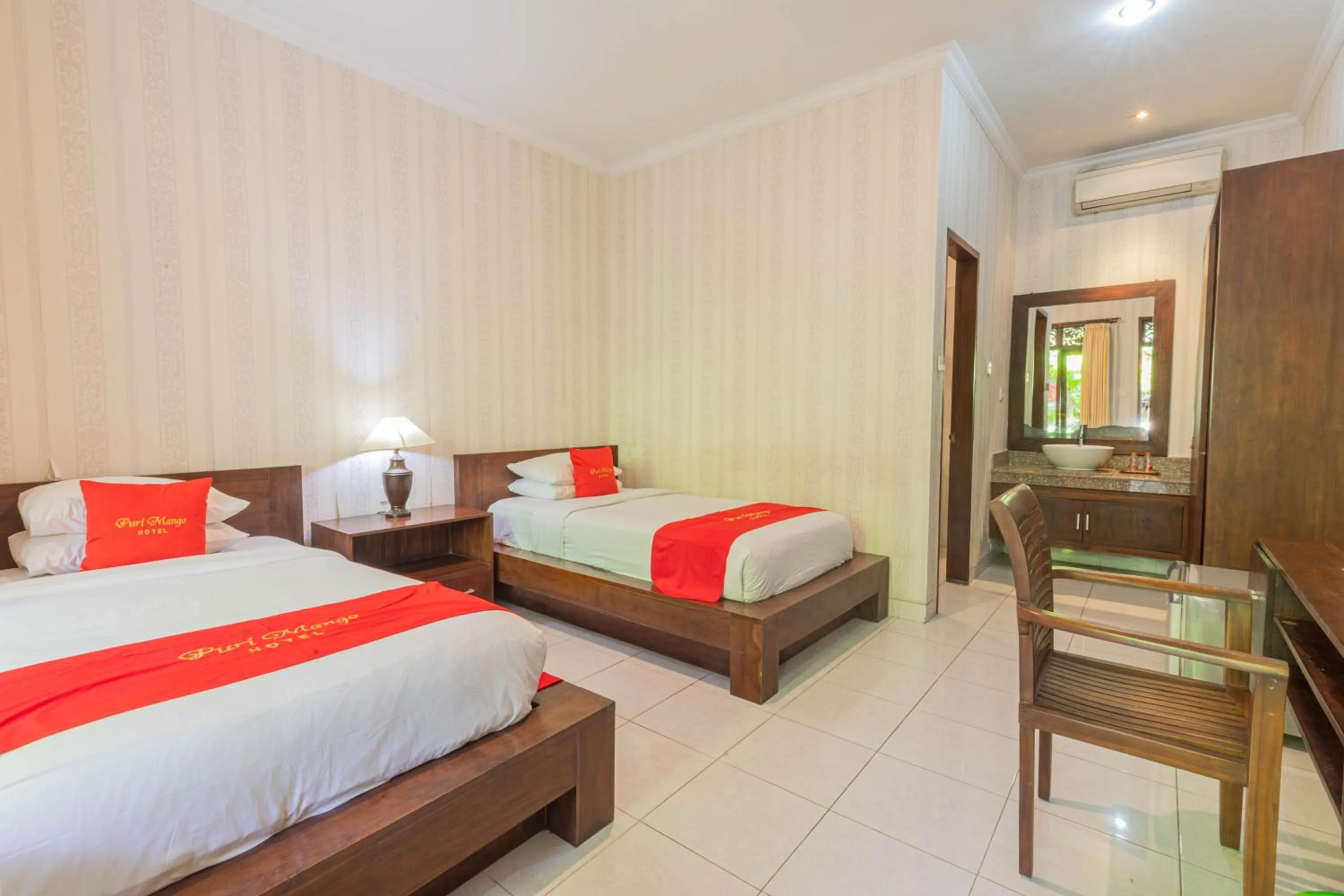 Bedroom in Puri Mango Guest House Sanur