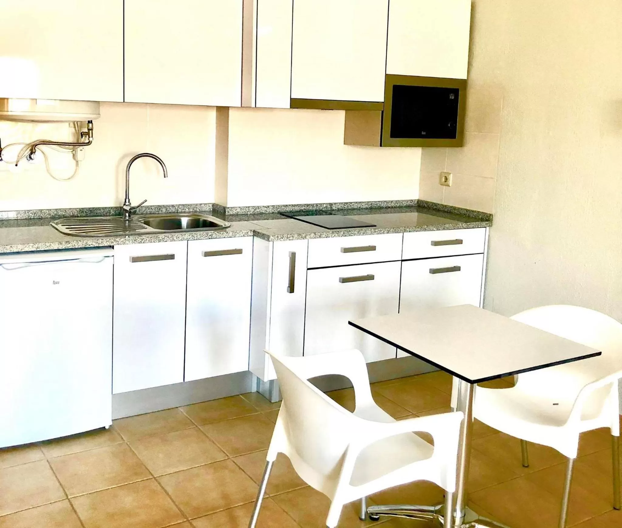 Kitchen or kitchenette in Albufeira Jardim by Umbral