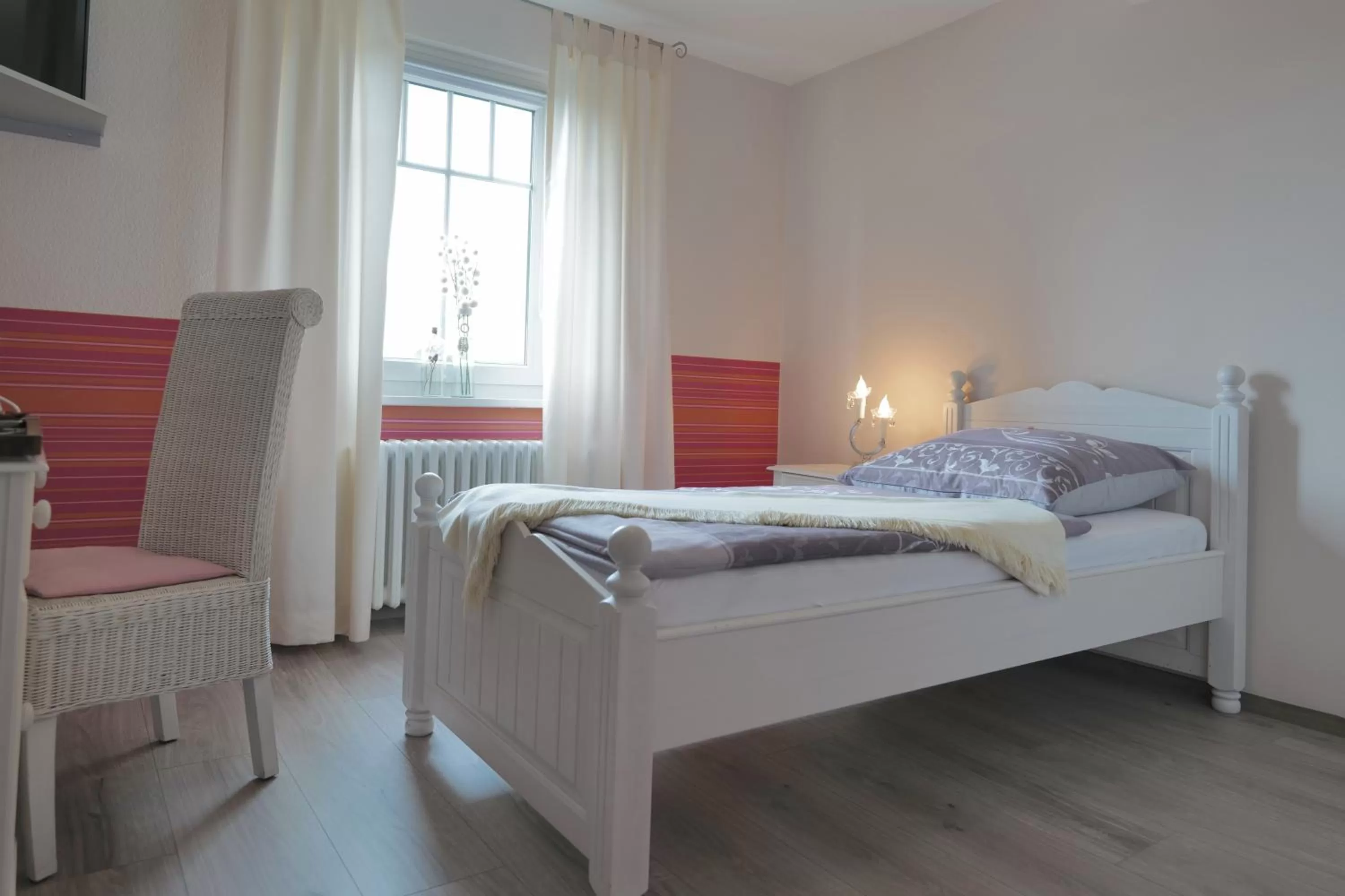 Bed in Elena Kempf Haaratelier & Guesthouse