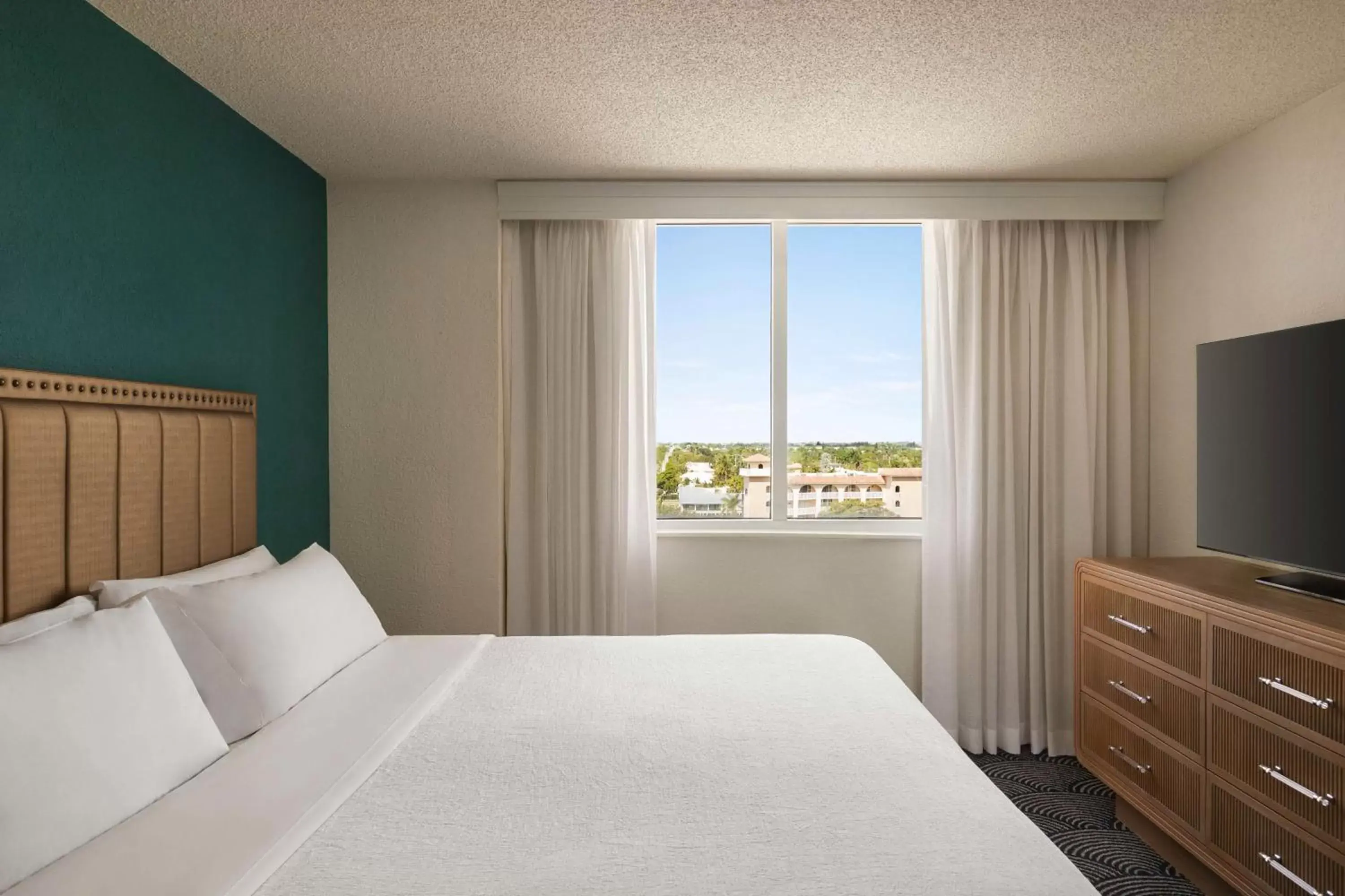 One-Bedroom King Suite with Roll-in Shower - Mobility Accessible in Embassy Suites by Hilton Deerfield Beach Resort & Spa One-Bedroom King Suite with Roll-in Shower - Mobility Accessible in Embassy Suites by Hilton Deerfield Beach Resort & Spa