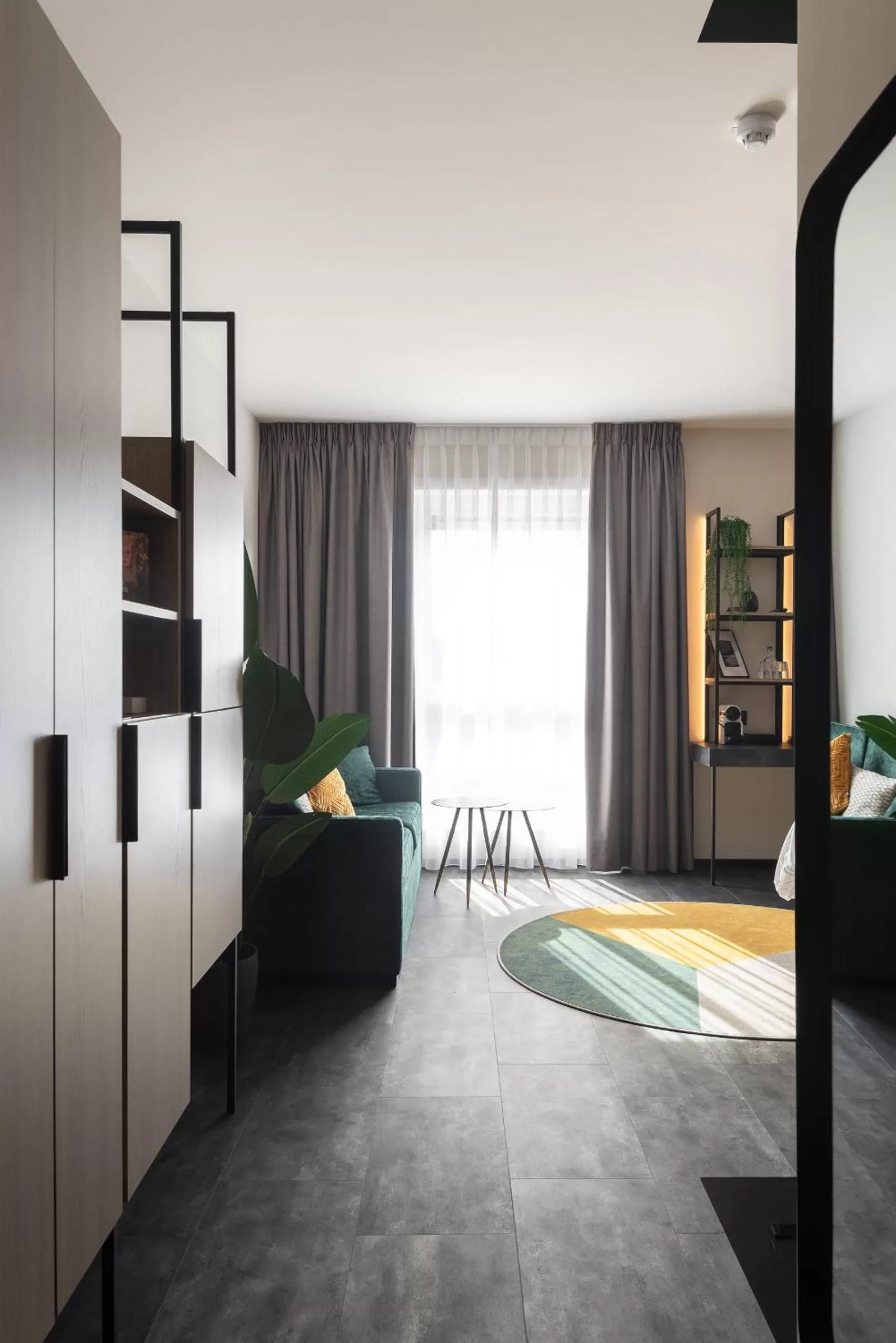 Seating area, Bed in Ariane Hotel