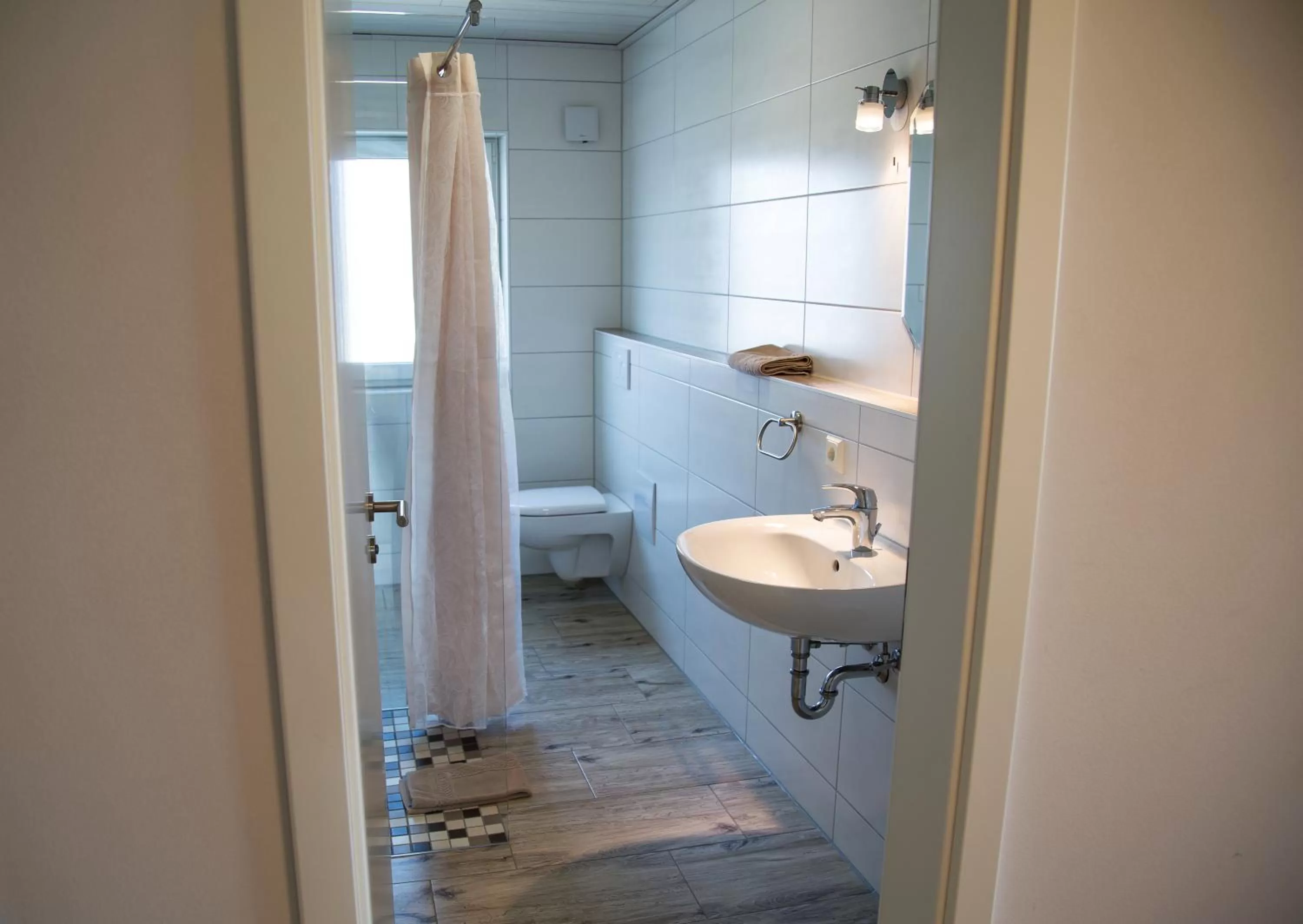 Bathroom in Gästehaus und Fewo Lamm Garni