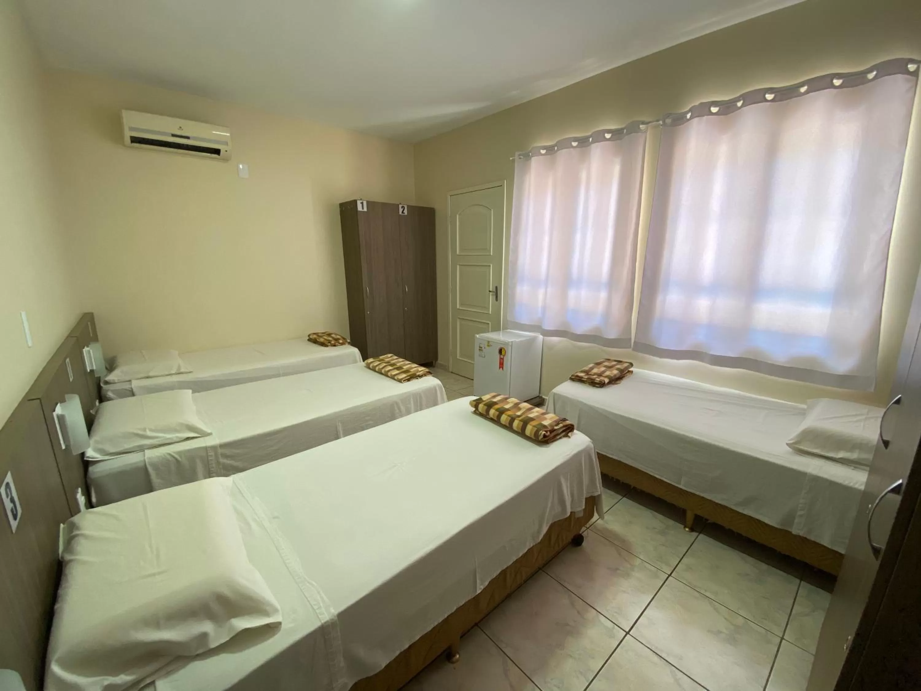 Bed in Pousada El Shaddai