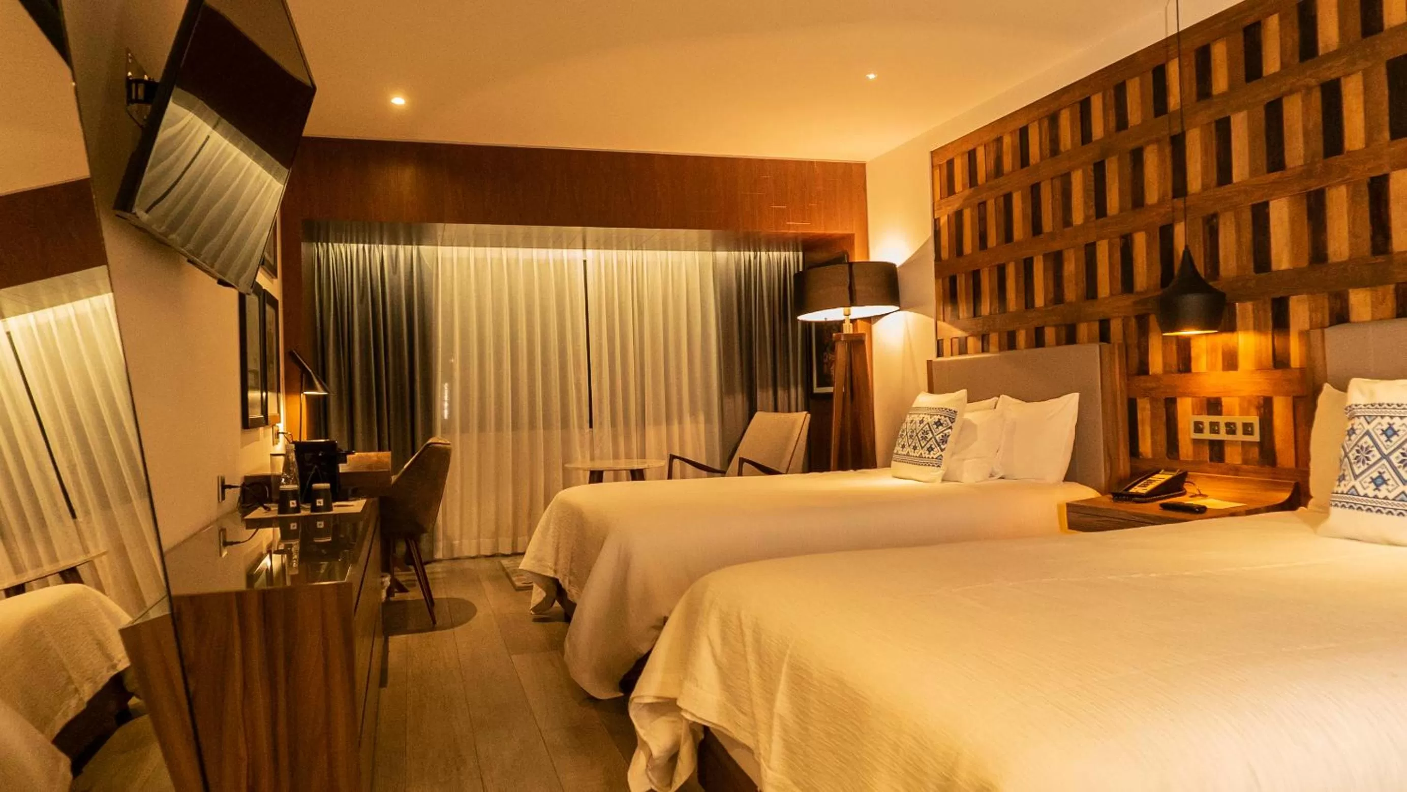 Bed in Hotel Indigo Guadalajara Expo by IHG