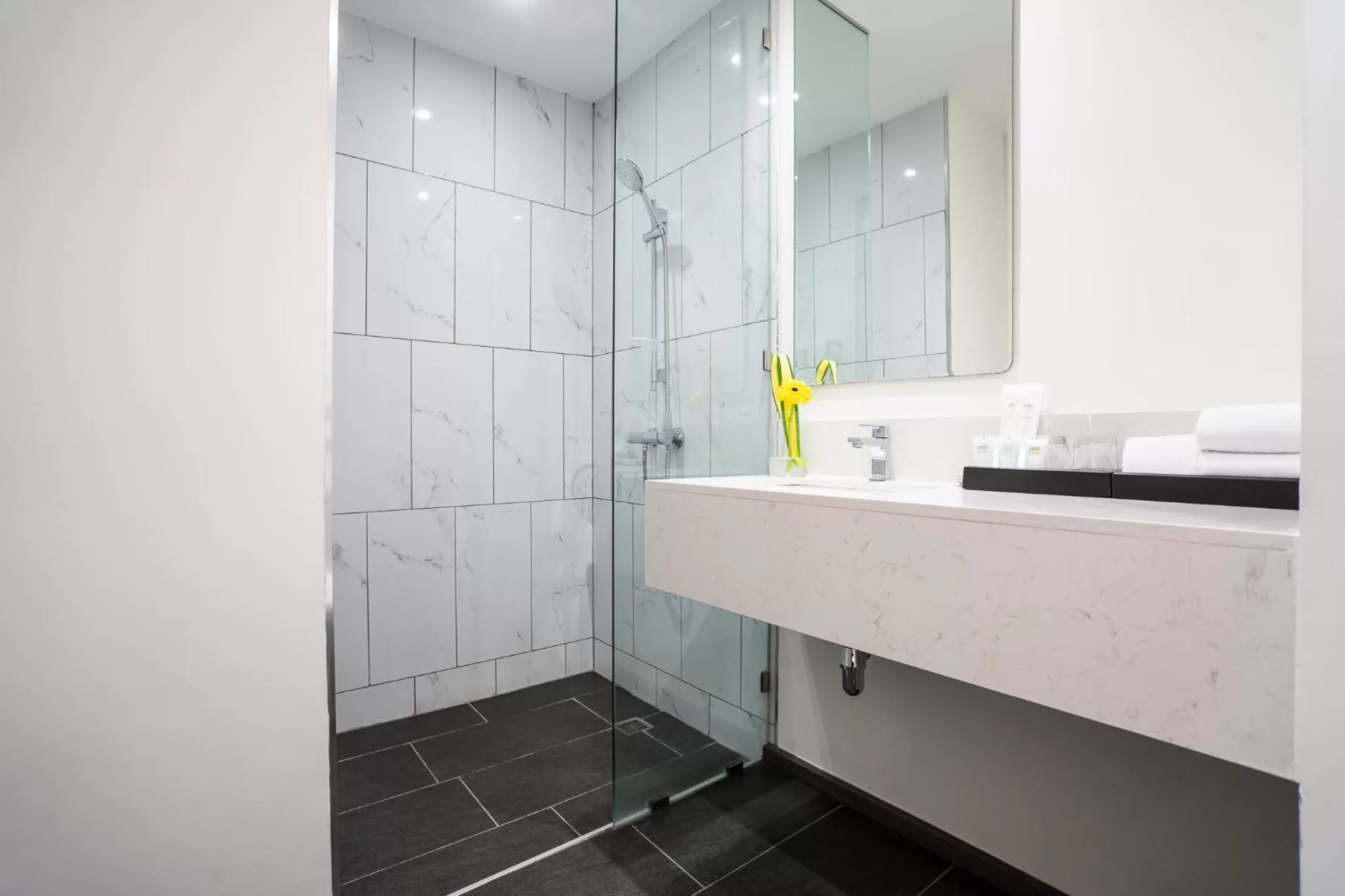 Bathroom in One Patio Hotel Pattaya - SHA Extra Plus