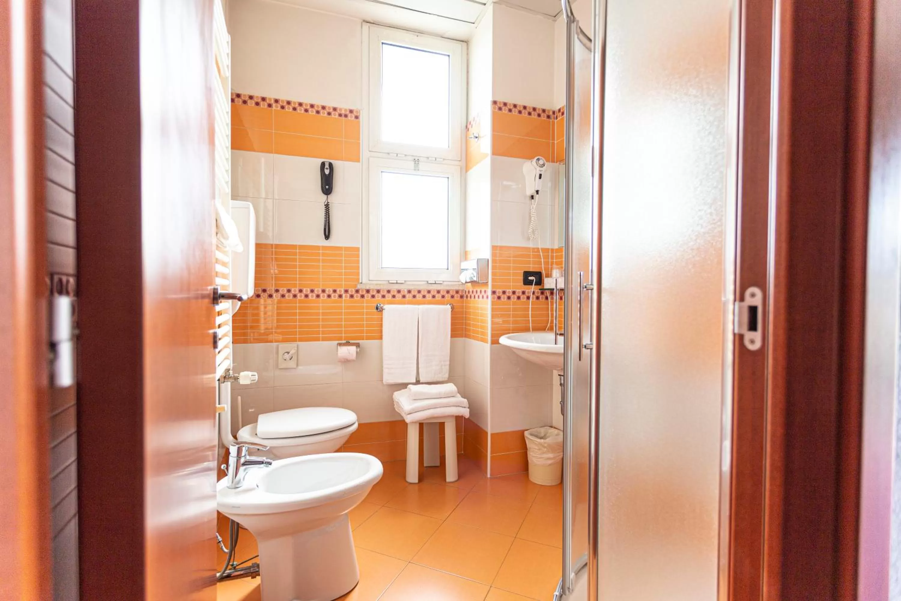 Bathroom in Residence & Suites