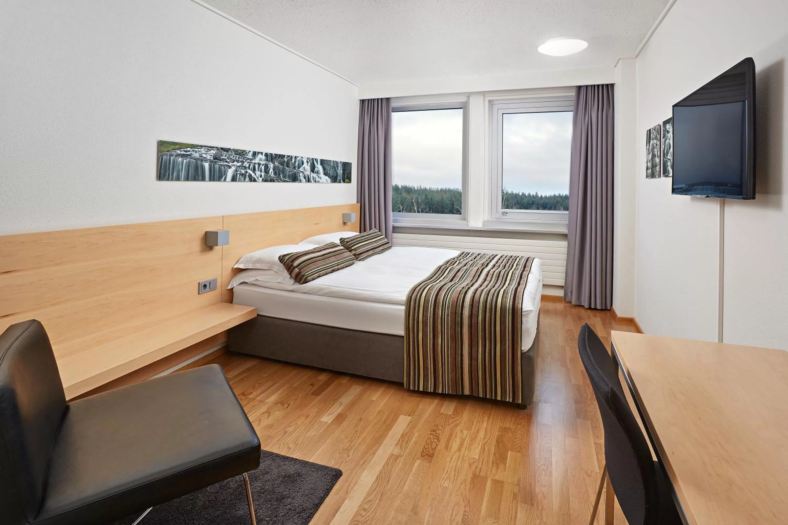 TV and multimedia, Bed in Reykjavik Natura - Berjaya Iceland Hotels