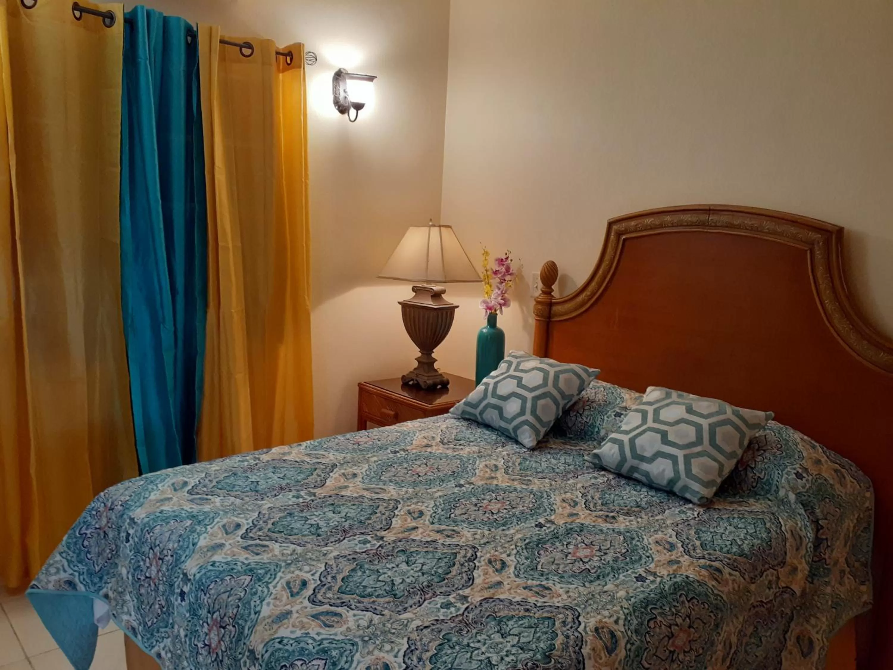 Bed in Connie's Comfort Suites