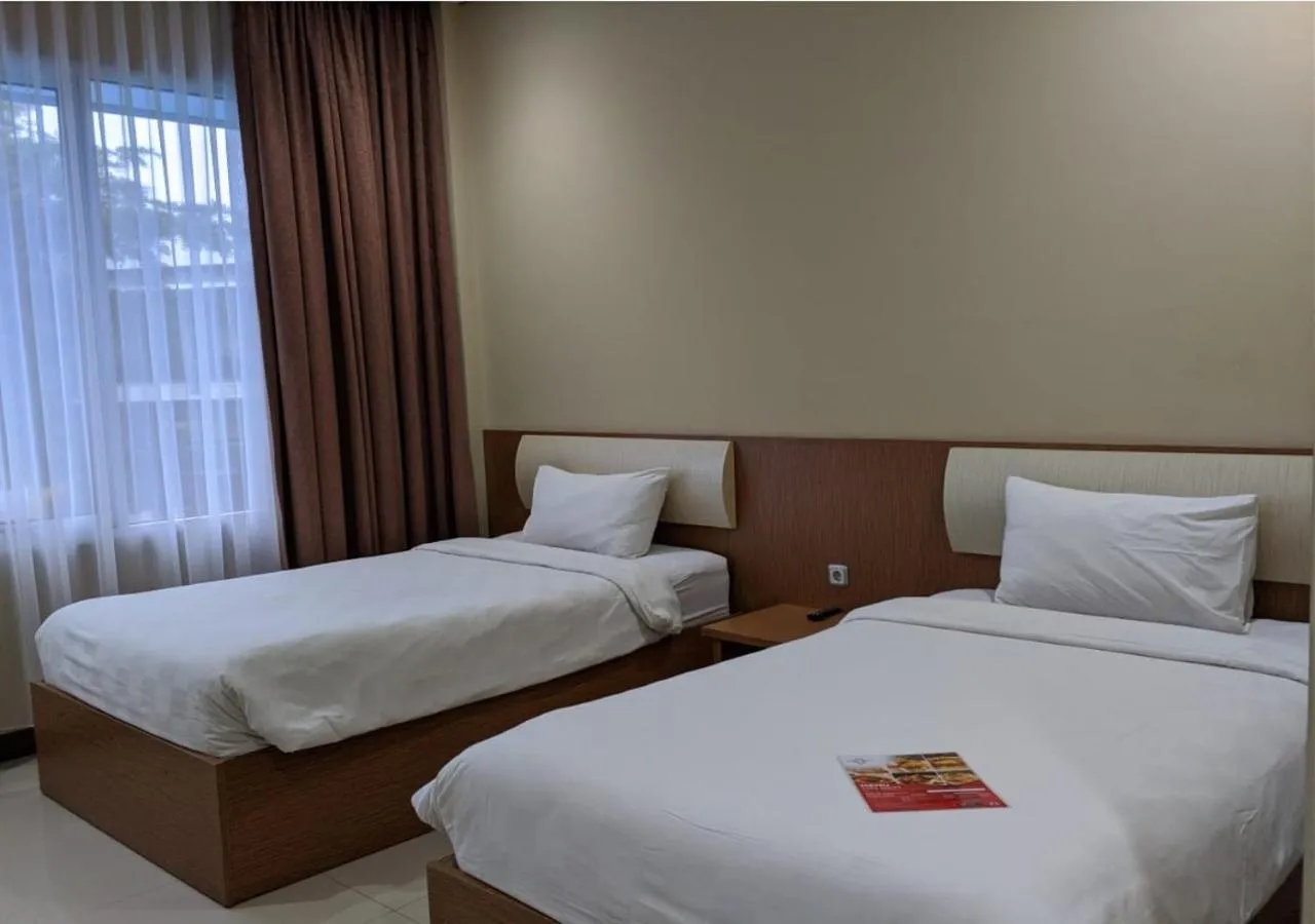 Bed in Grand Cordela Hotel AS Putra Kuningan