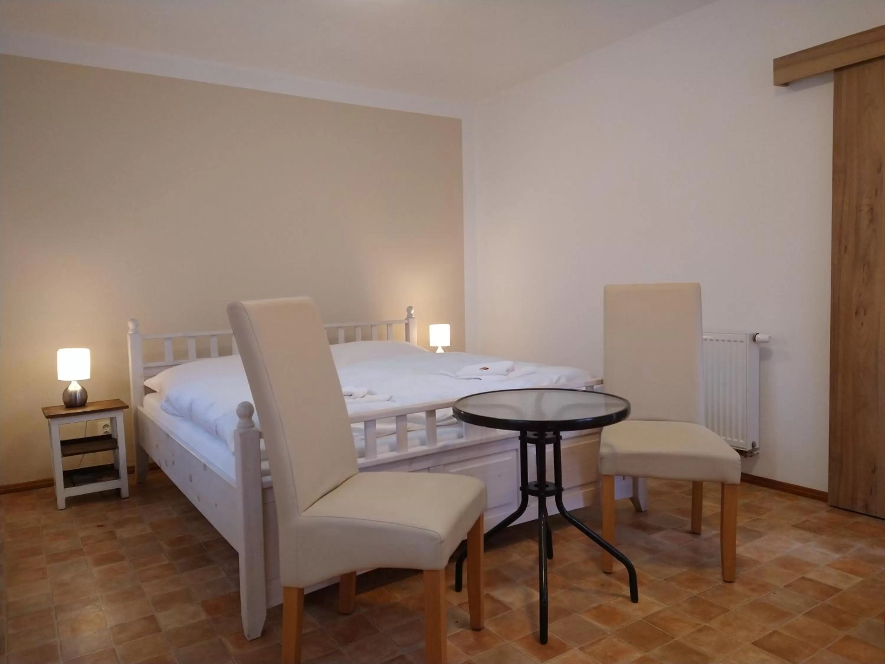 Dining area, Bed in Apartmány Malý mnich