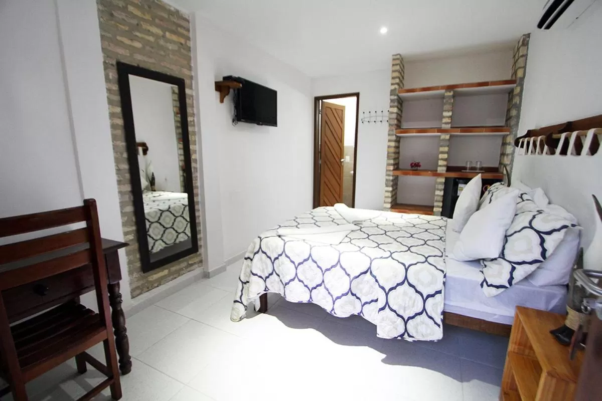 Photo of the whole room, Bed in Pousada Recanto da Praia