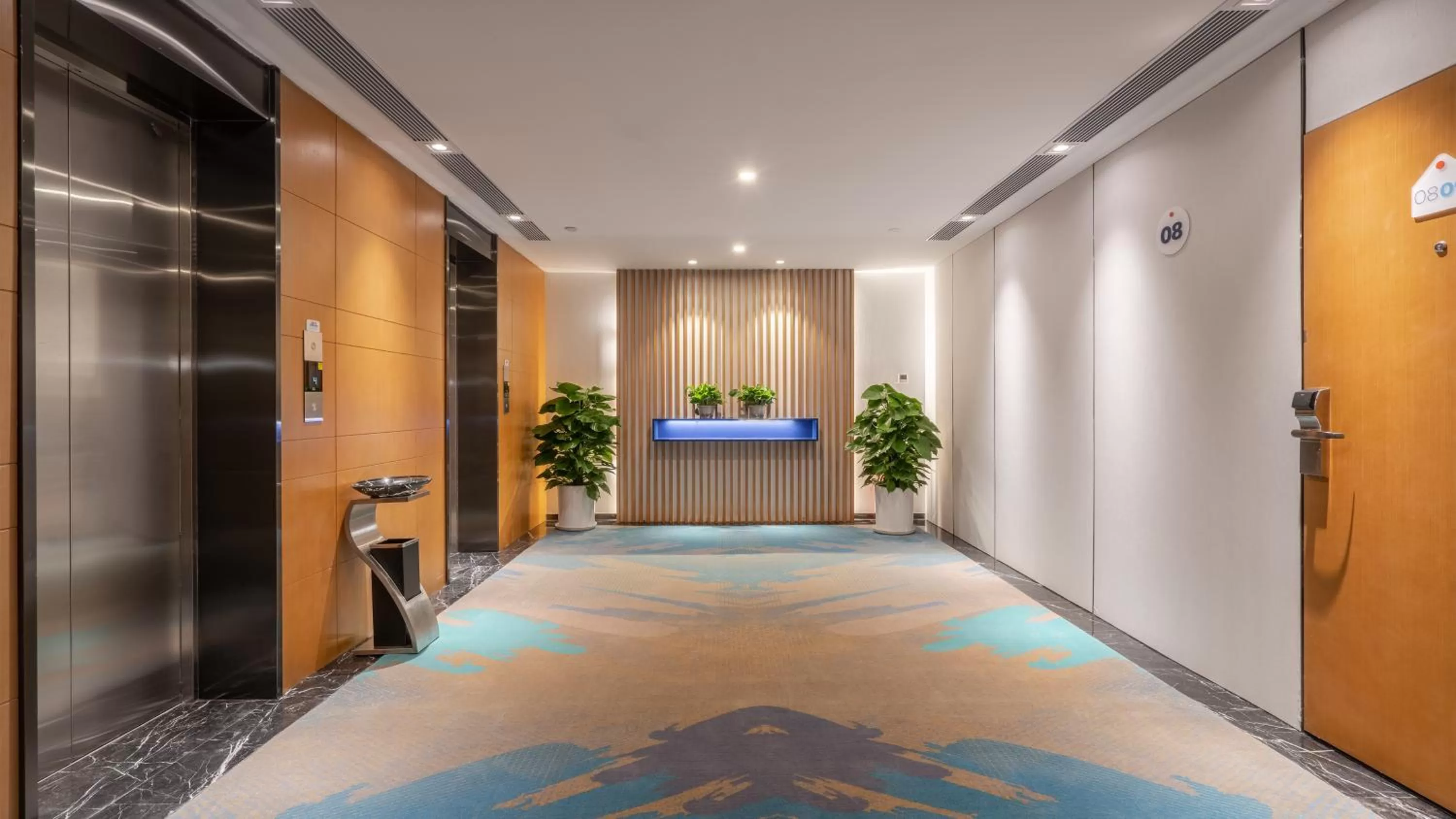 elevator, Bed in Holiday Inn Express Qingdao City Center by IHG