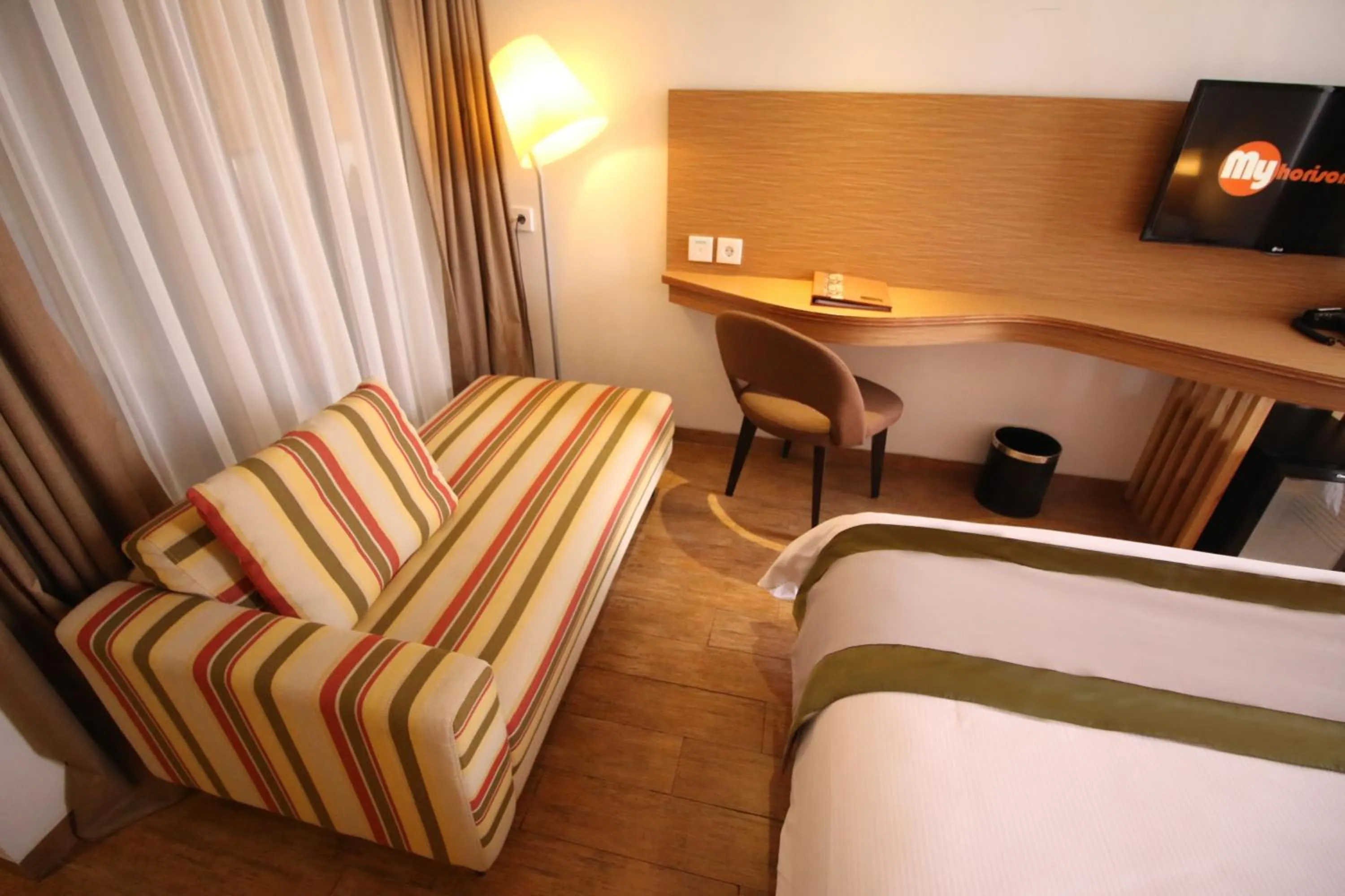 Bed in Liberta Hotel Jimbaran