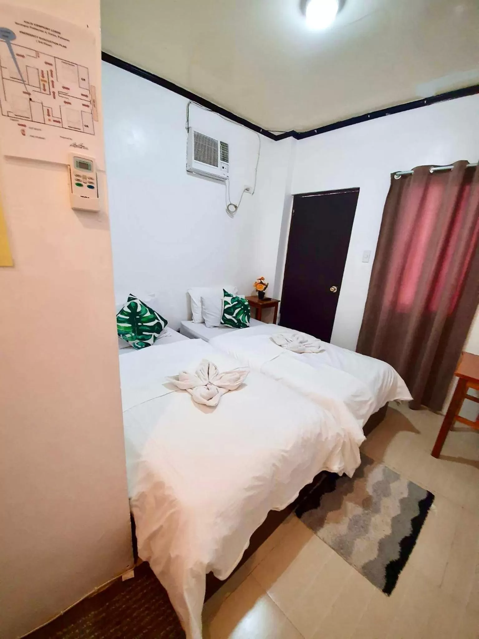 Bed in Kalis Viewpoint Lodge Coron