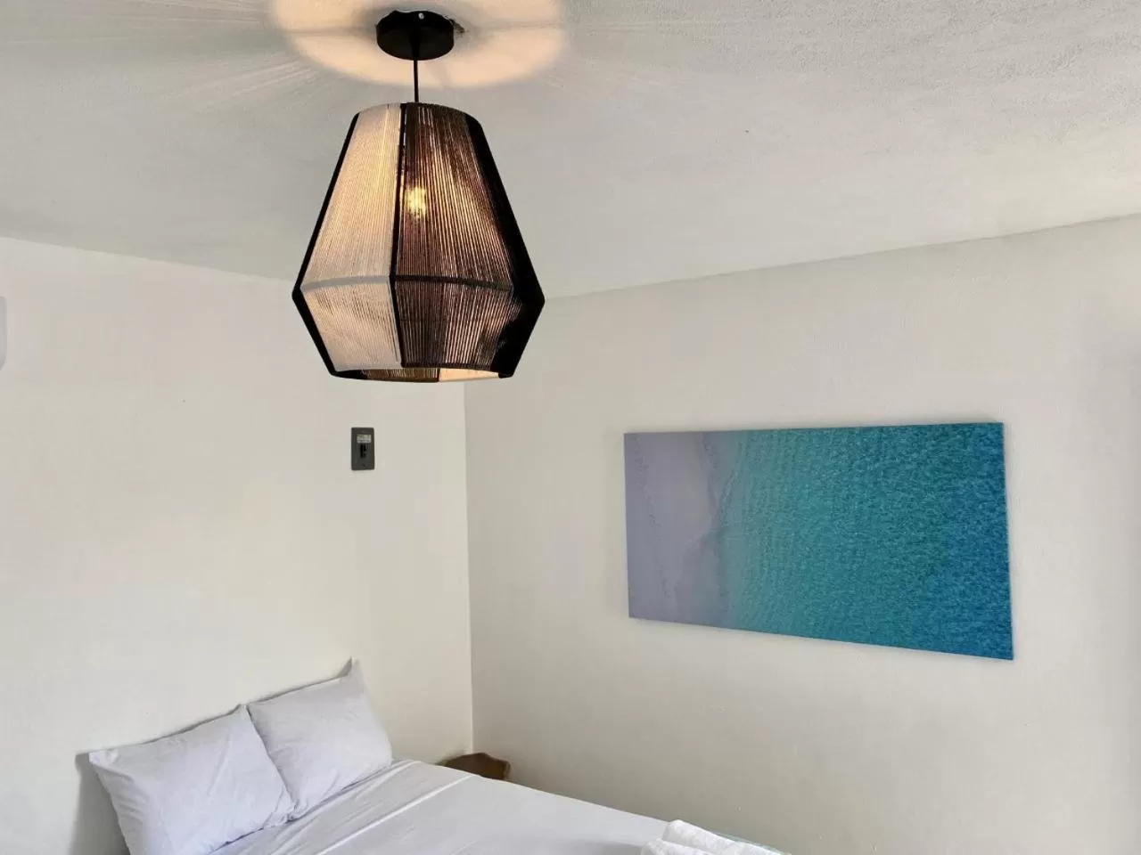 Bed in Casa Colibrí El Cuyo