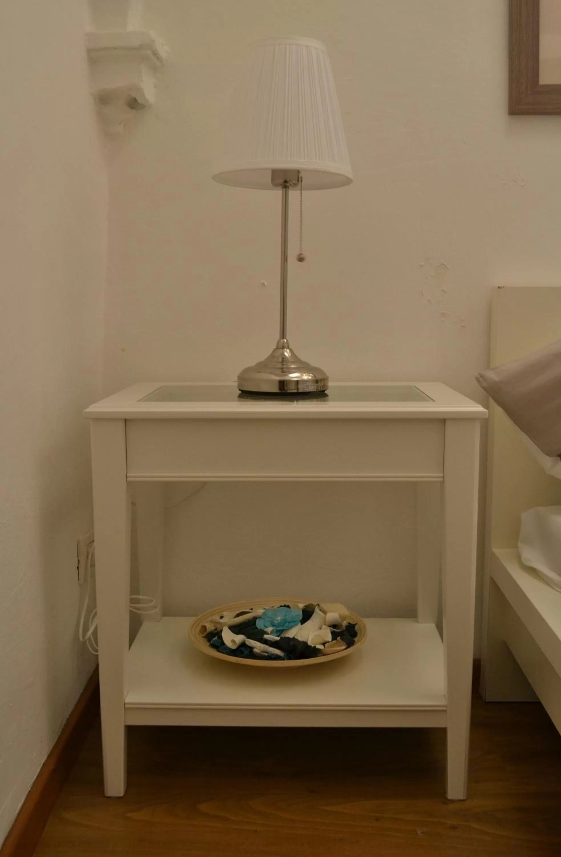 Decorative detail, Bed in Pontevecchio Relais