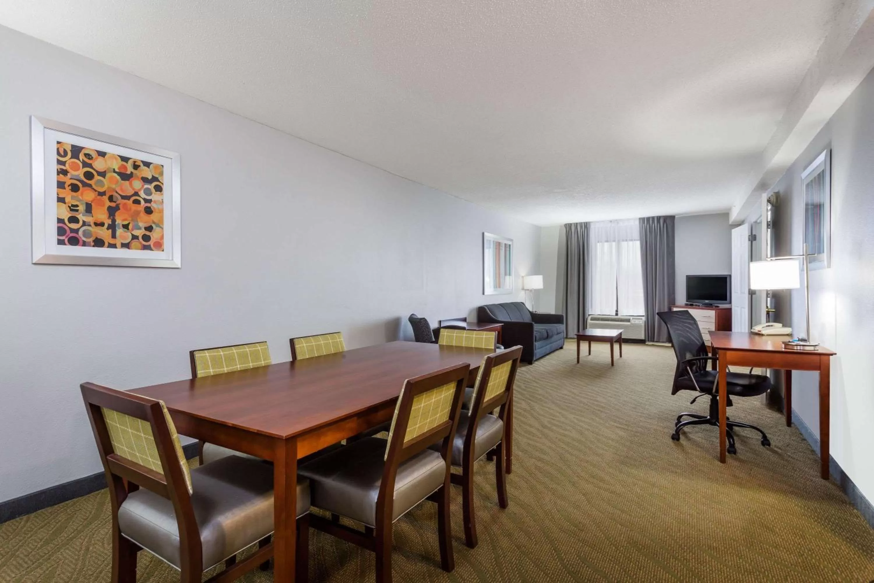 Living room in Wingate by Wyndham Chesapeake