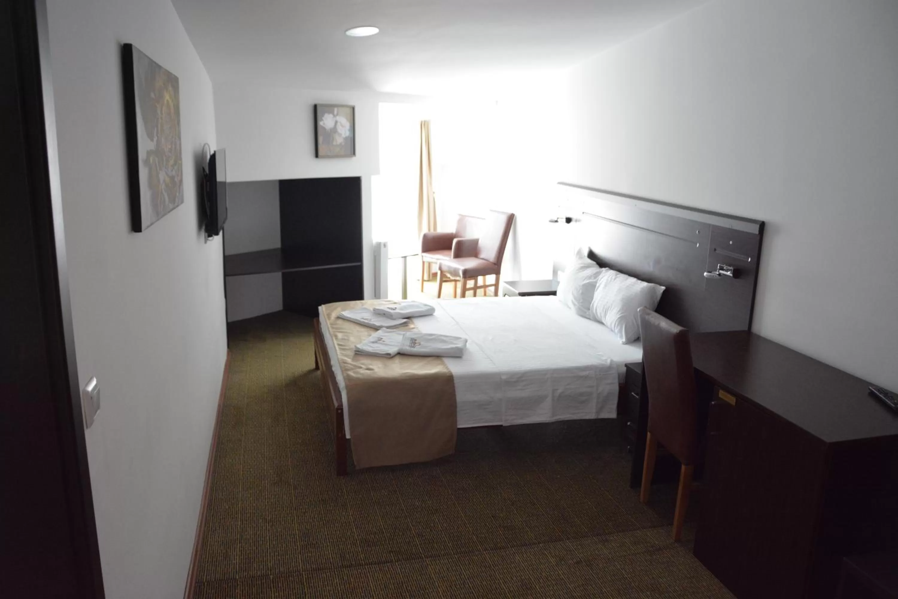 Bed in Arabella Hotel