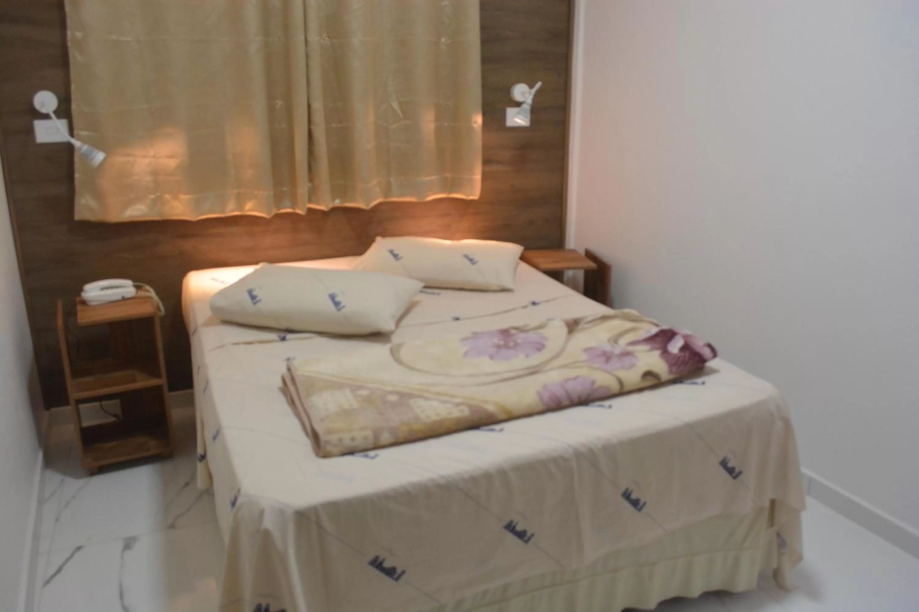 Bed in New Point Hotel