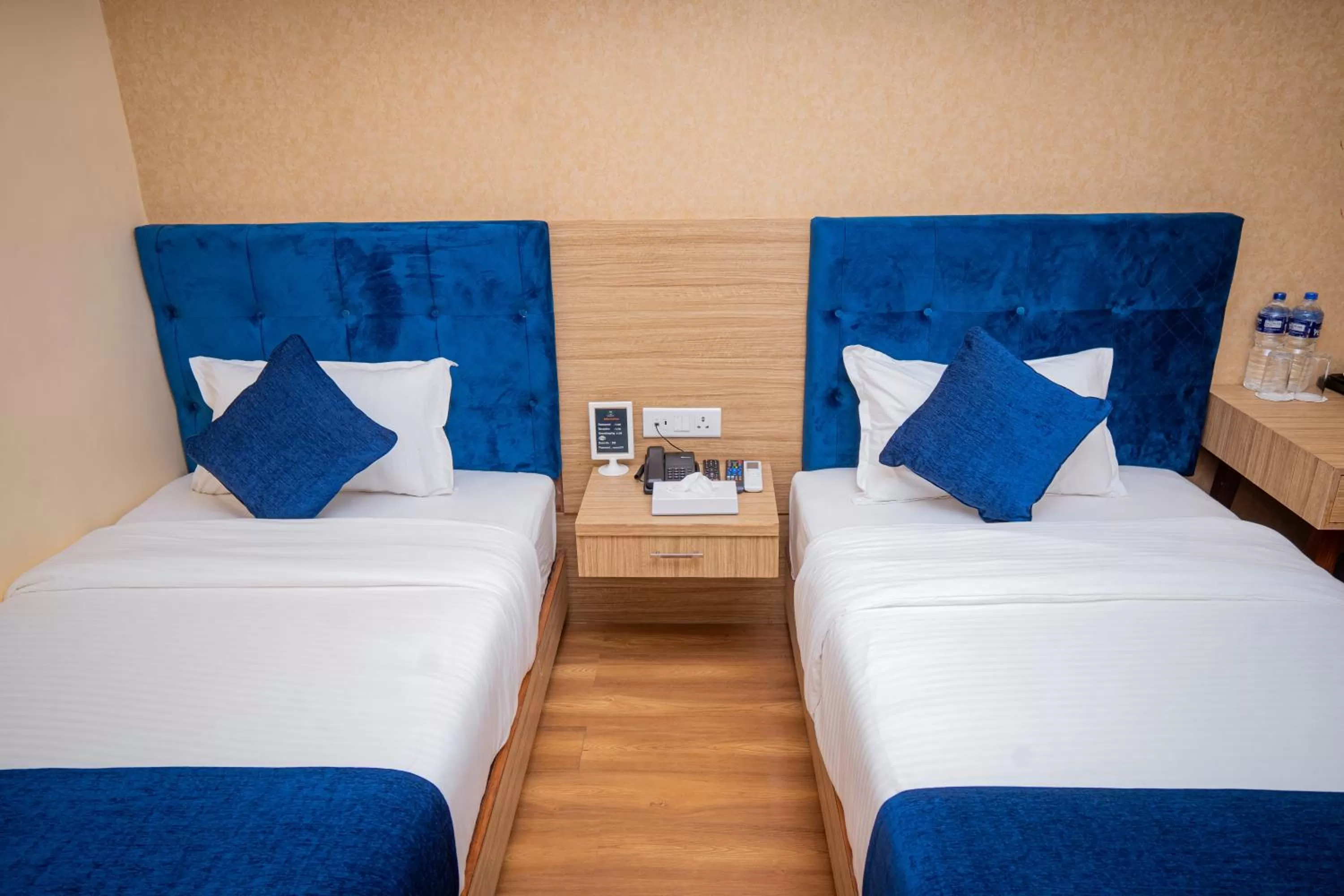 Bed in Majestic Lake Front Hotel & Suites